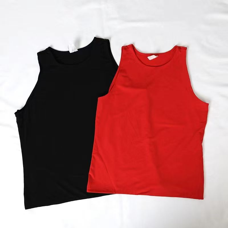 Black and red women's tank tops laid flat side by side.