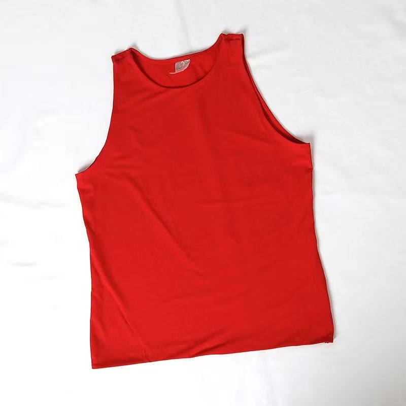 Front view of red women's tank top with crew neck laid flat.