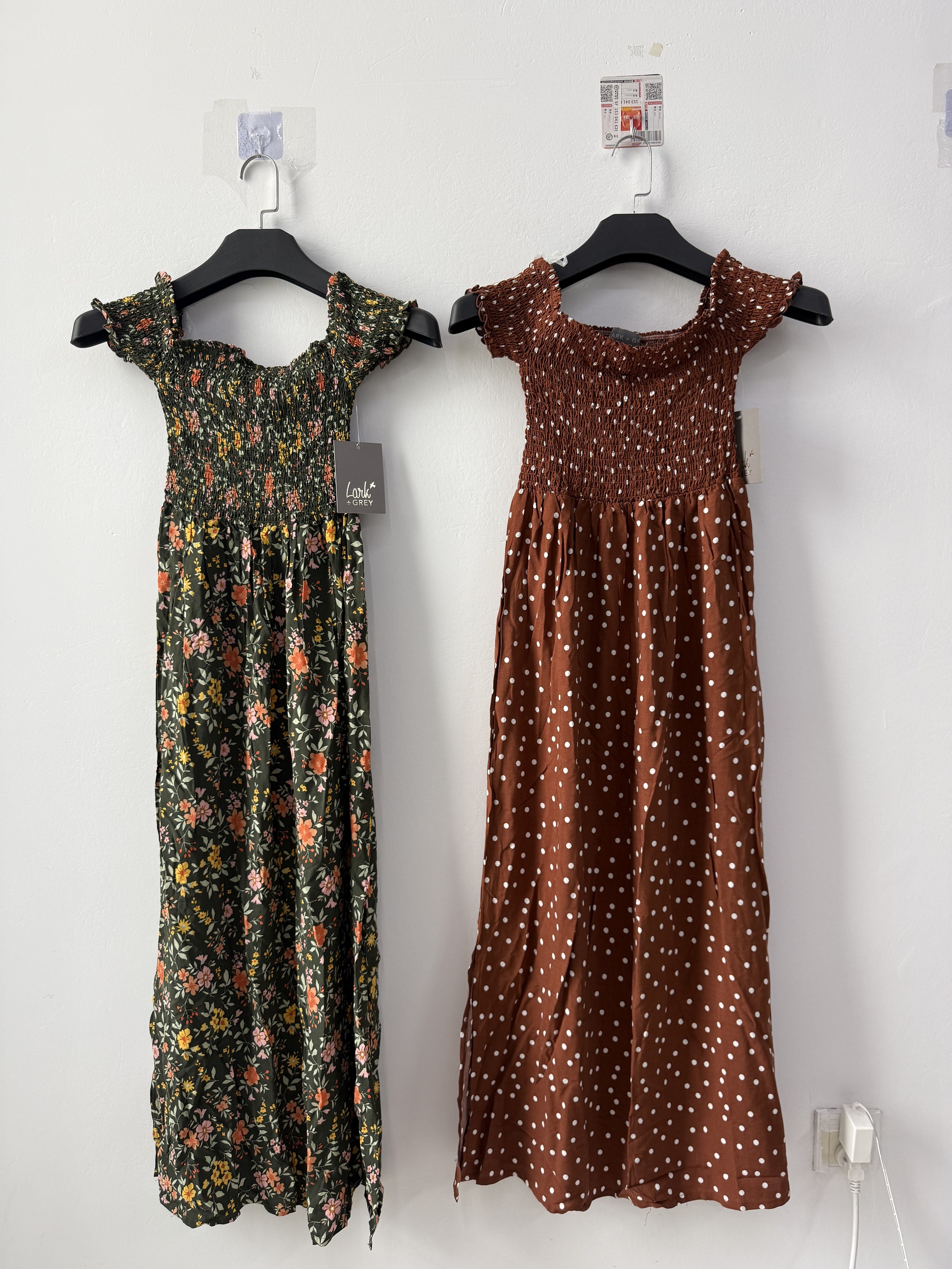 Women's polka dot midi dresses with short sleeves, displayed together in black and white, cocoa and ivory, and printed patterns.