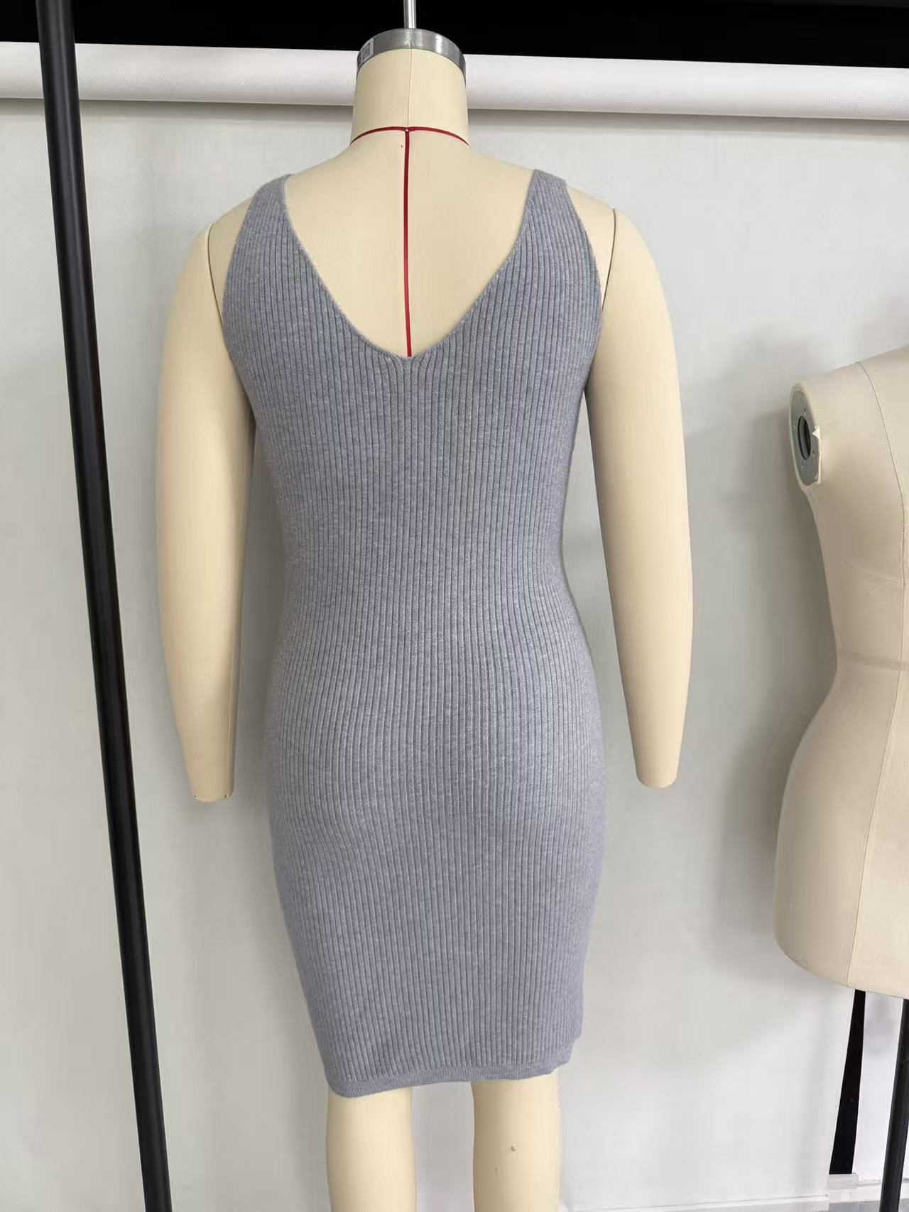 Grey women's ribbed knit short-sleeve midi dress with crew neck displayed on a torso mannequin.