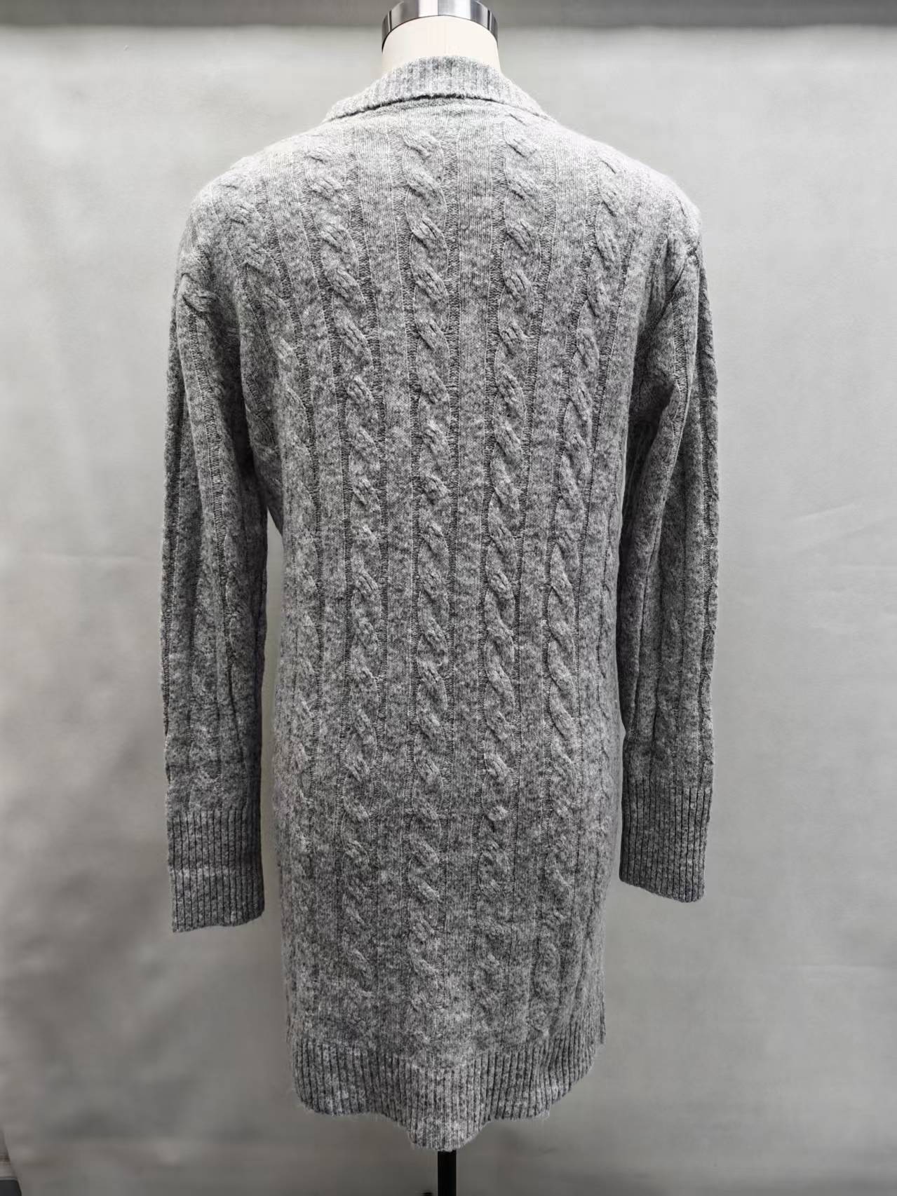 Black women's open-front cardigan sweater displayed on a torso mannequin.