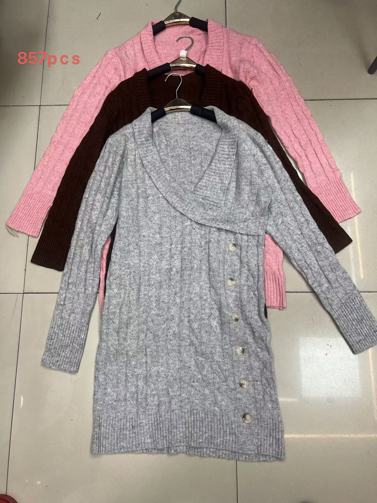 Front view of grey women's open-front cardigan sweater laid flat.