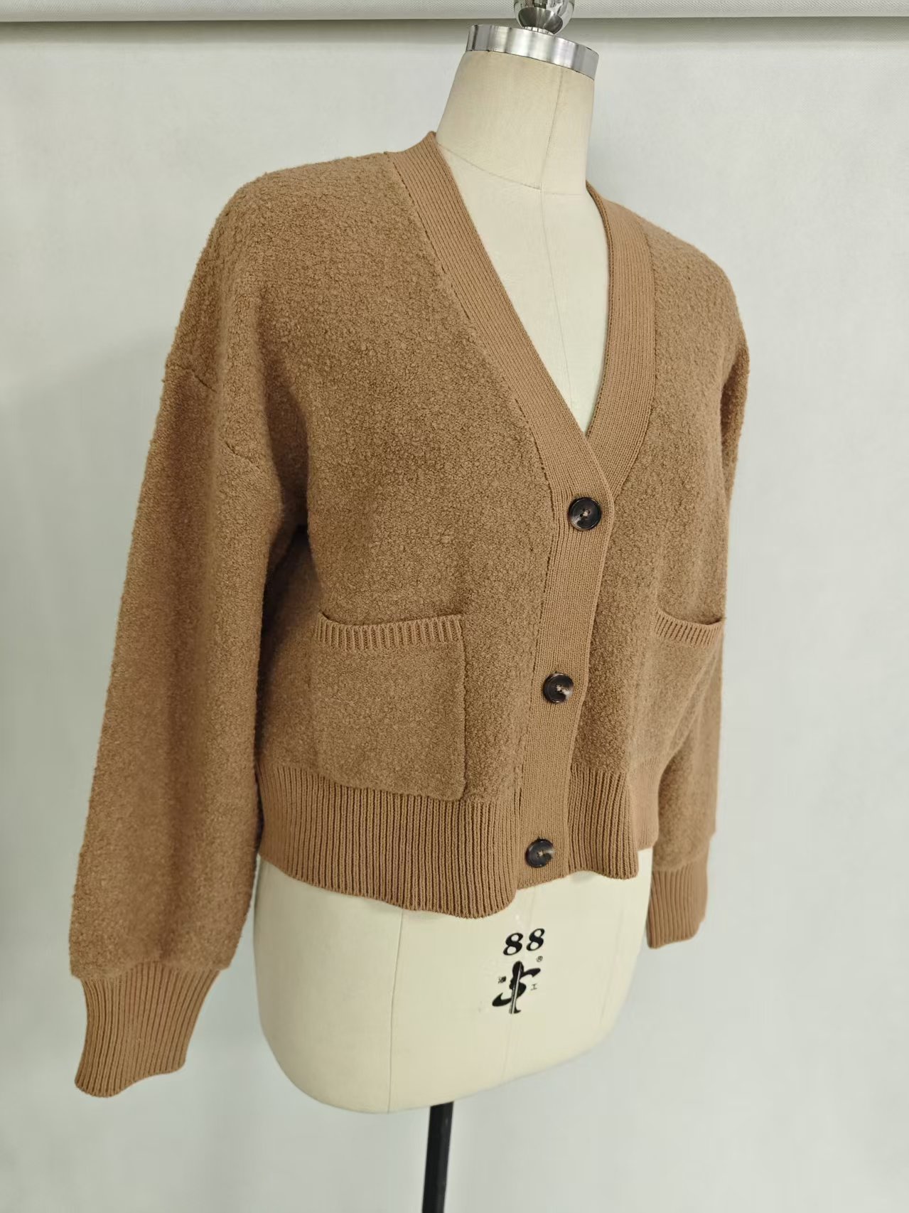 Front view of ladies' camel knit cardigan - Style TF8827