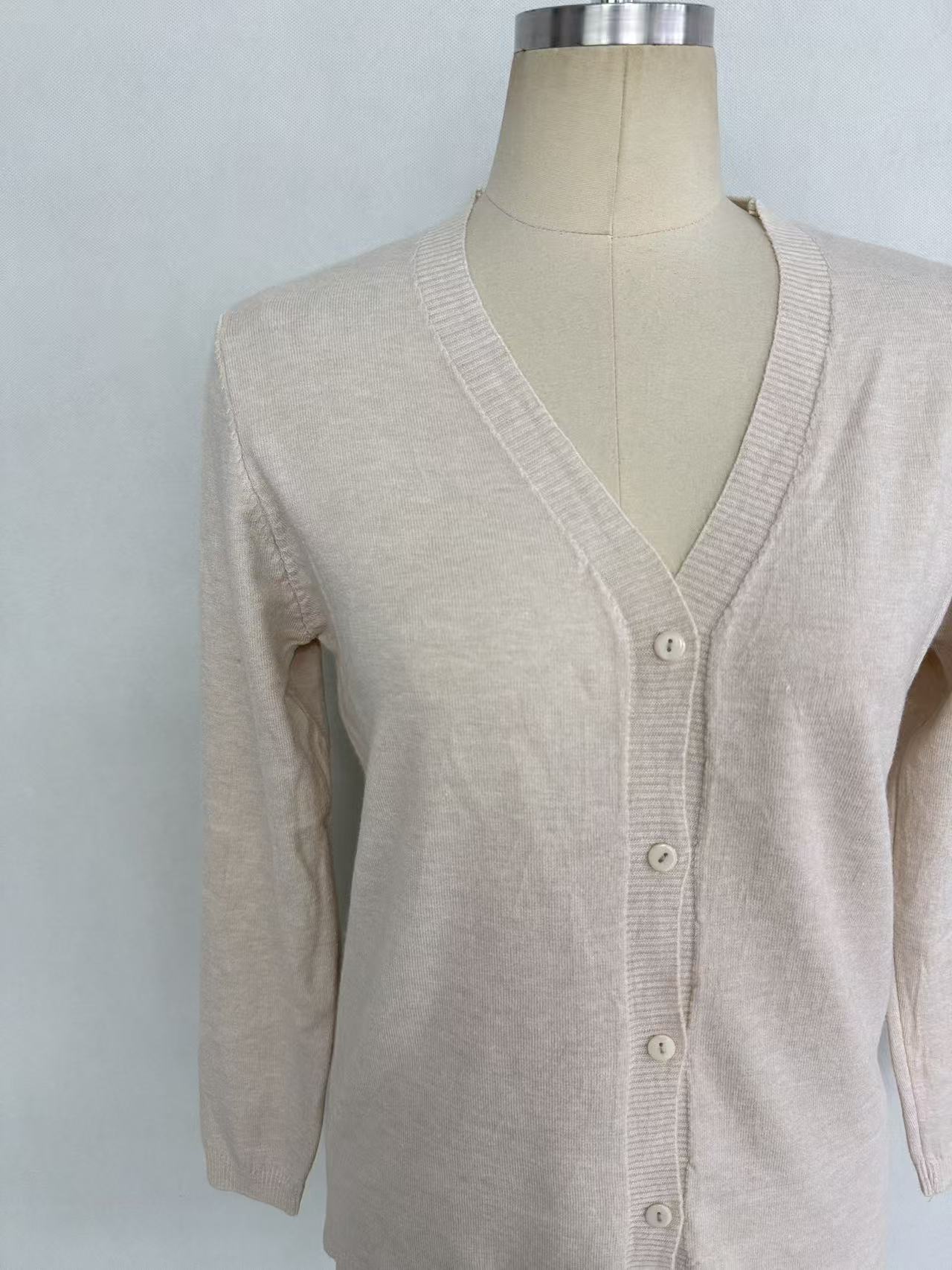 Front view of women's off white knit cardigan sweater TF8713