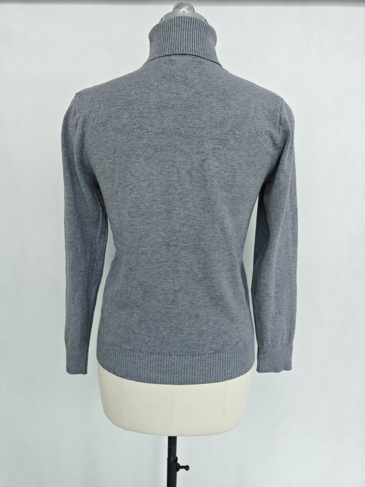 Front view of ladies' turtleneck knitwear sweater style TF8663