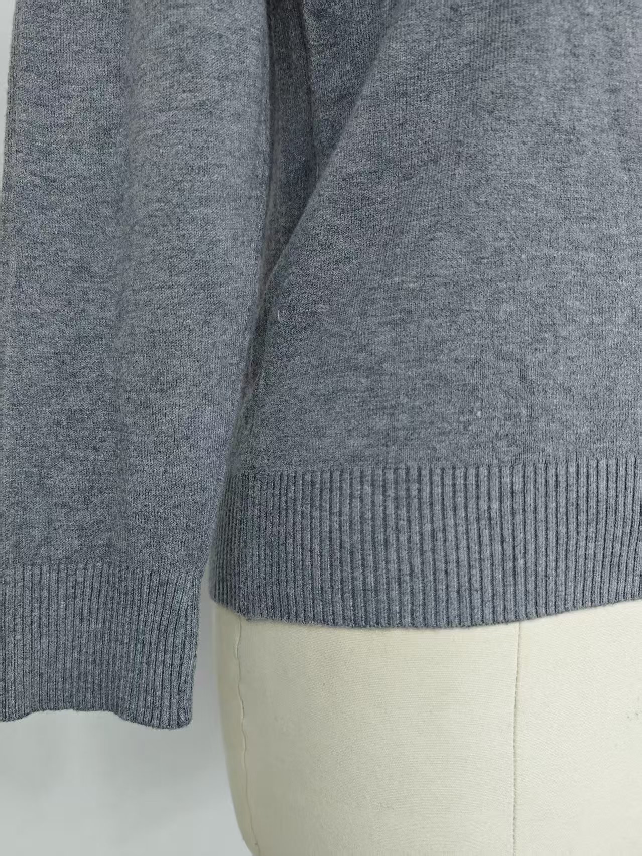 Ribbed hem and side seam detail on ladies' sweater TF8663