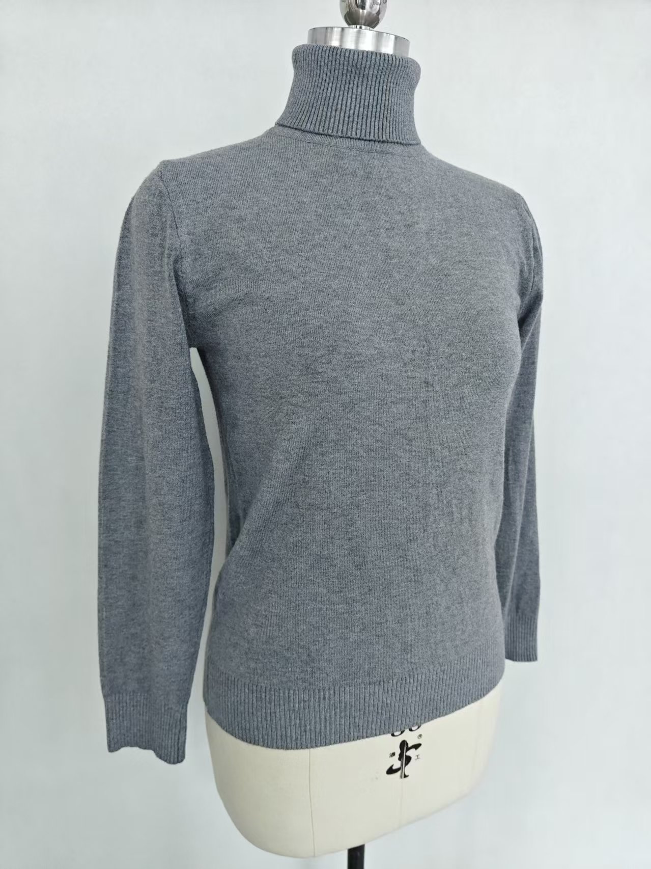 Back view of women's turtleneck knit sweater style TF8663