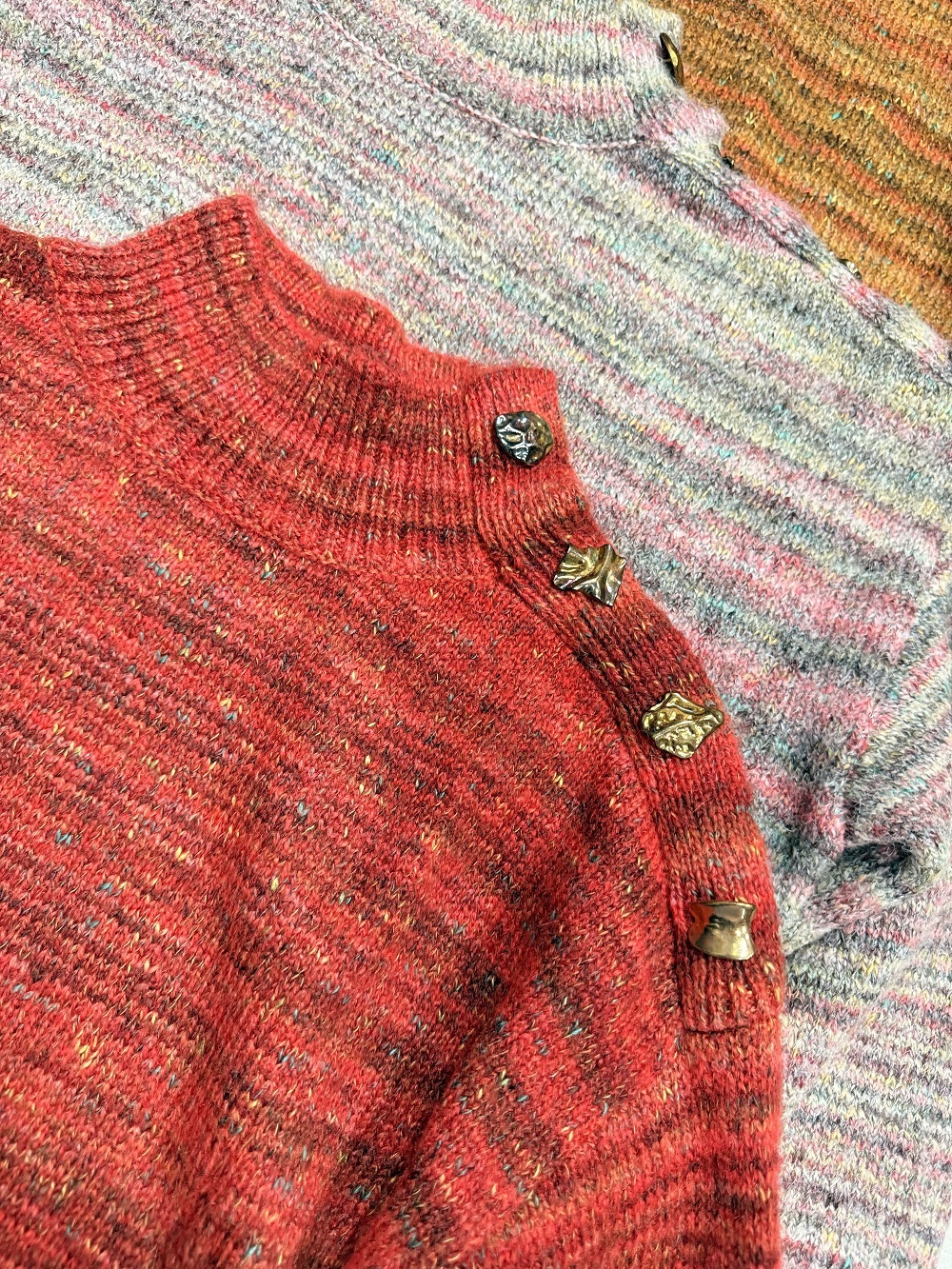 Front view of women's red knit sweater TF8740