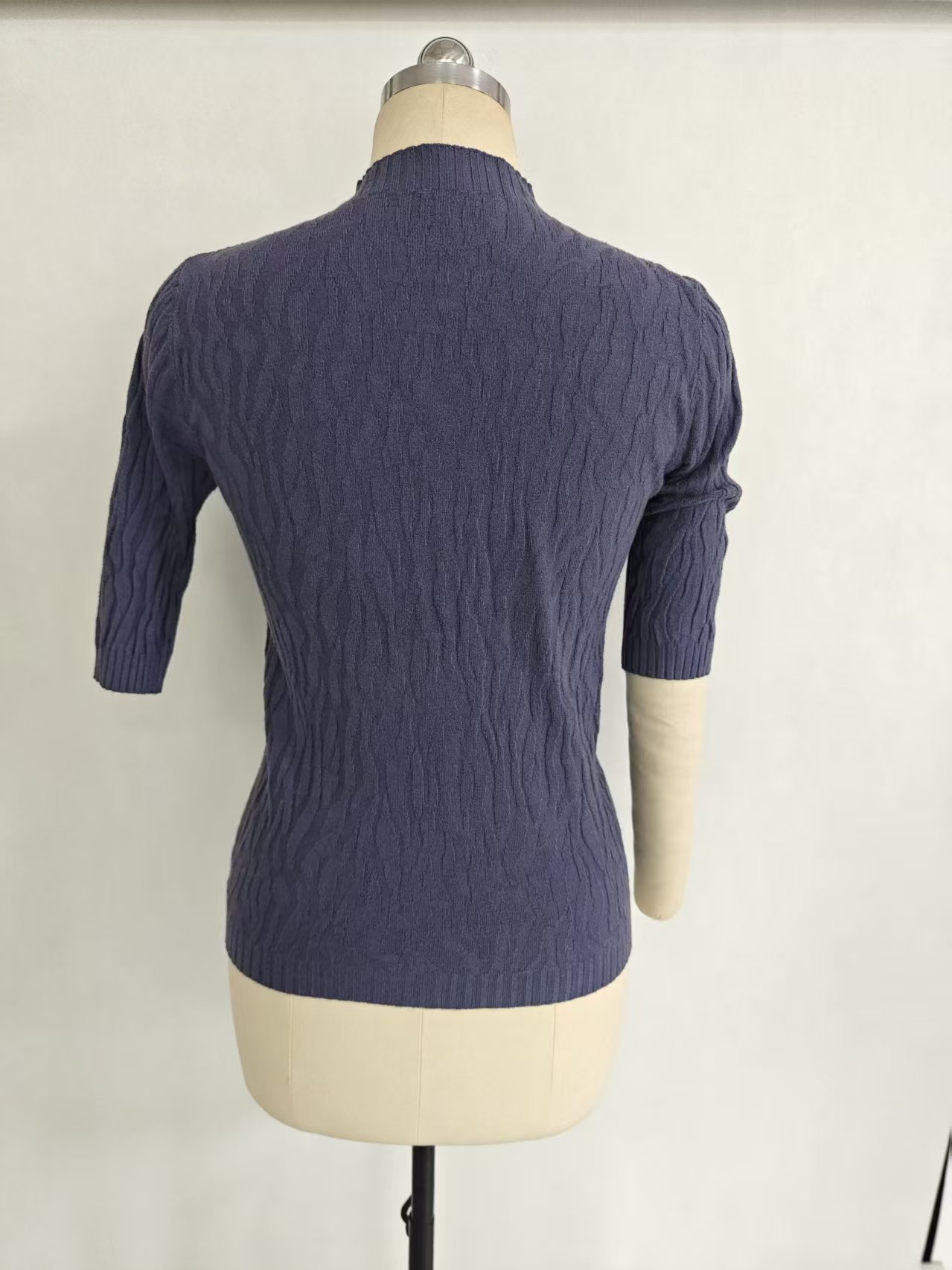 Back view of ladies' knit sweater TF8750