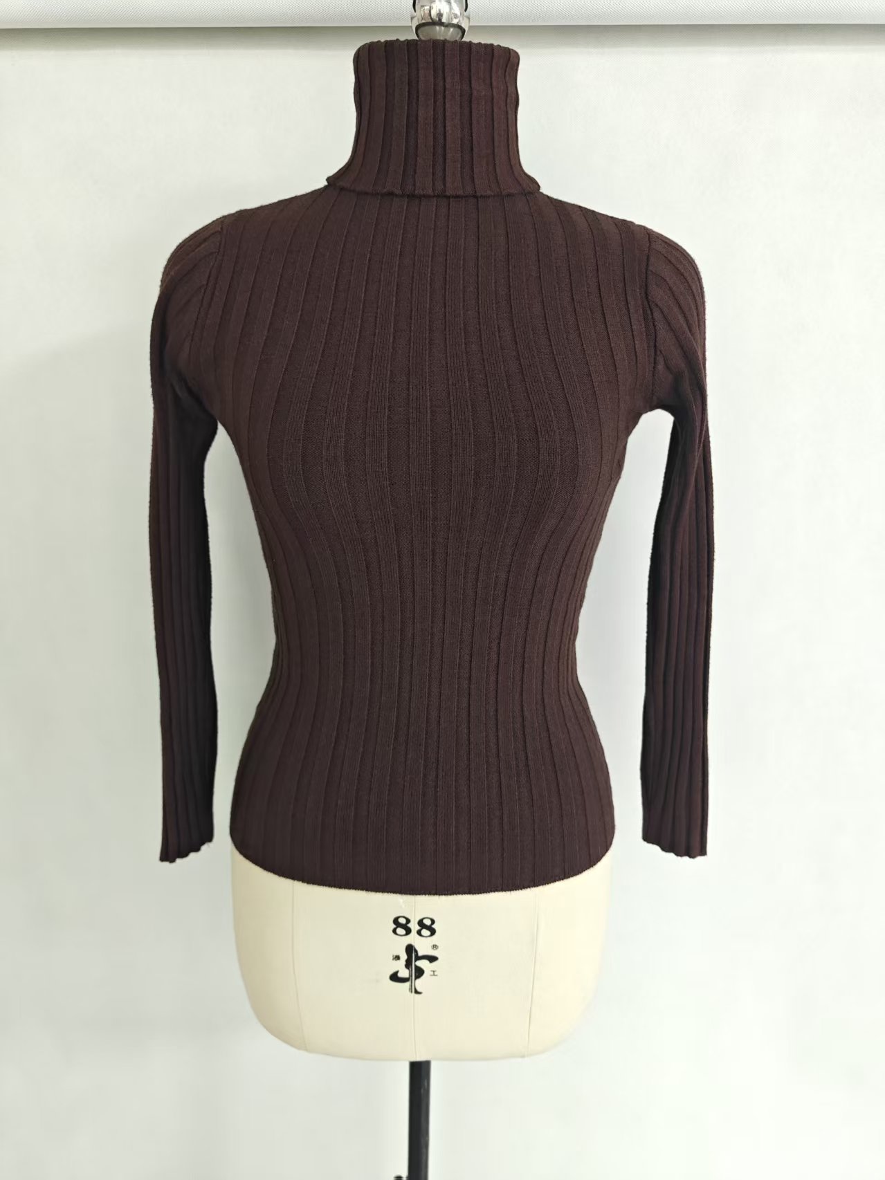 Dark brown ladies ribbed turtleneck sweater TF8829 front view on dress form