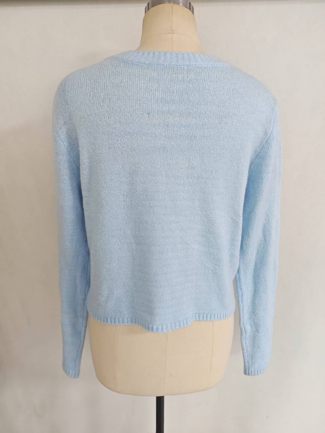 Wholesale women light blue snowflake knit sweater TF8843 back view on mannequin