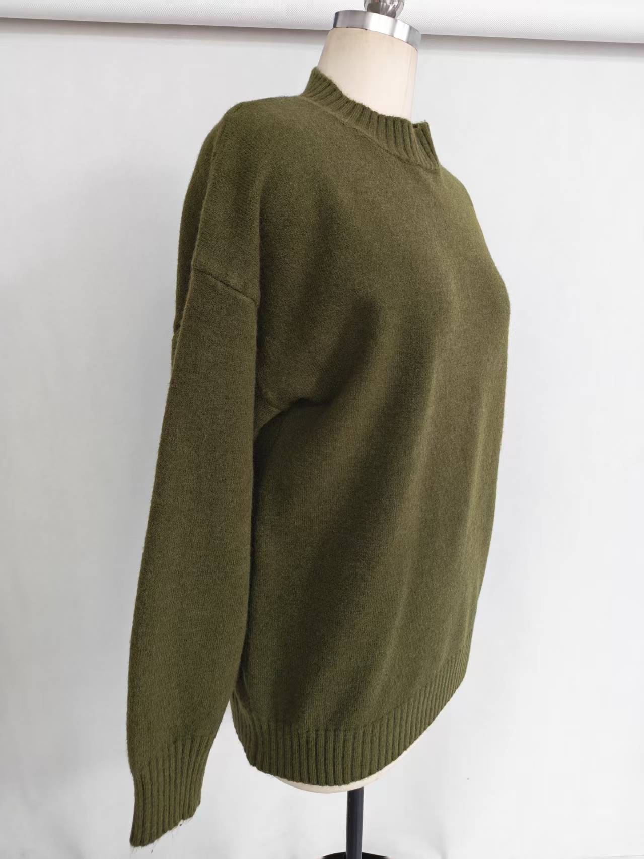 Wholesale women olive green loose fit knit sweater TF8861 side view on mannequin