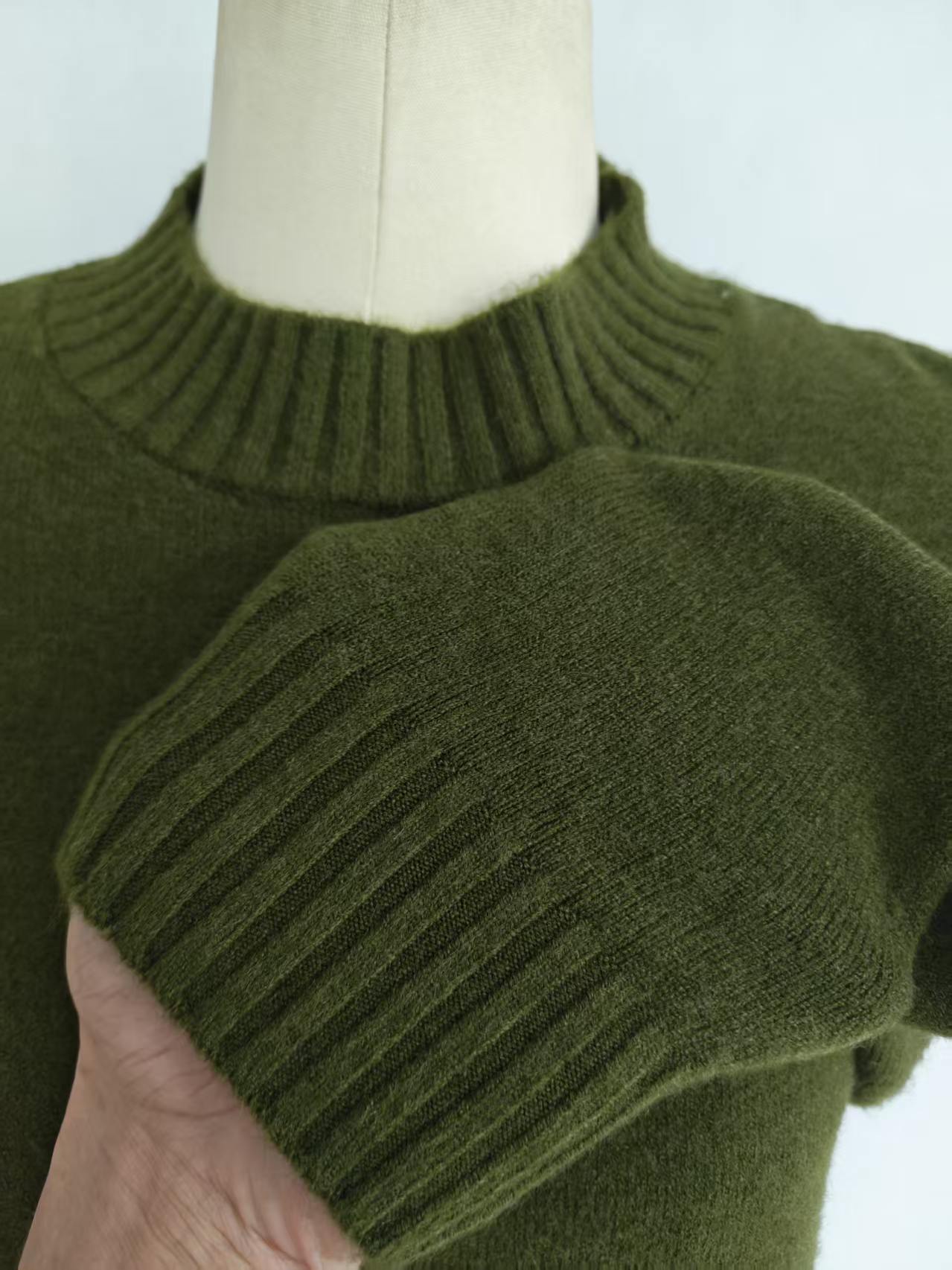 Close up crew neck collar and rib cuff detail ladies olive green knit sweater TF8861