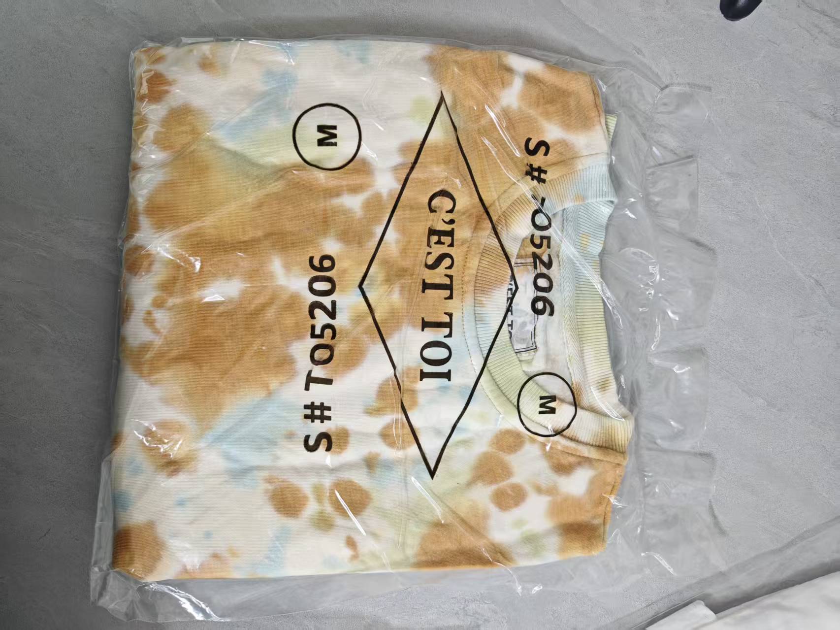 Packaged product shot ladies tie-dye sweatshirt TF8858