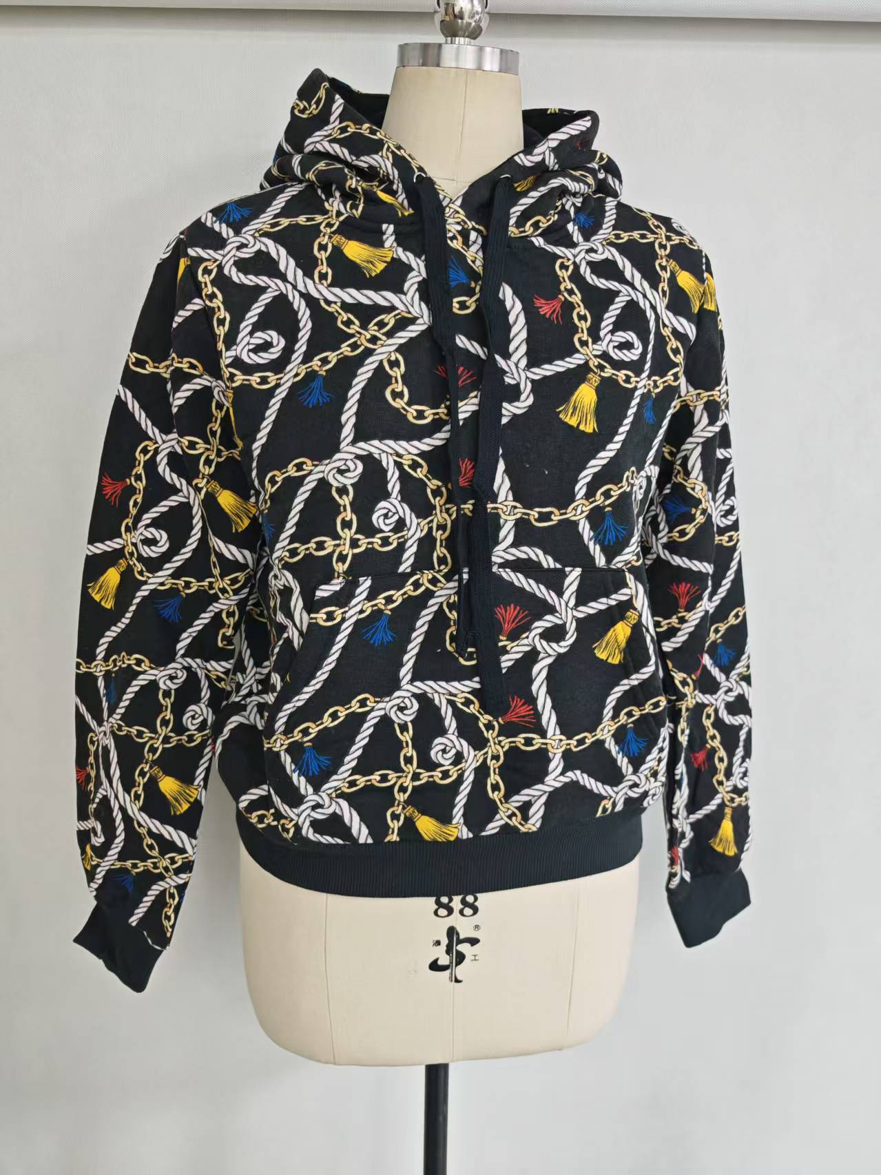 Wholesale ladies black chain print hooded sweatshirt TF8849 front view on mannequin