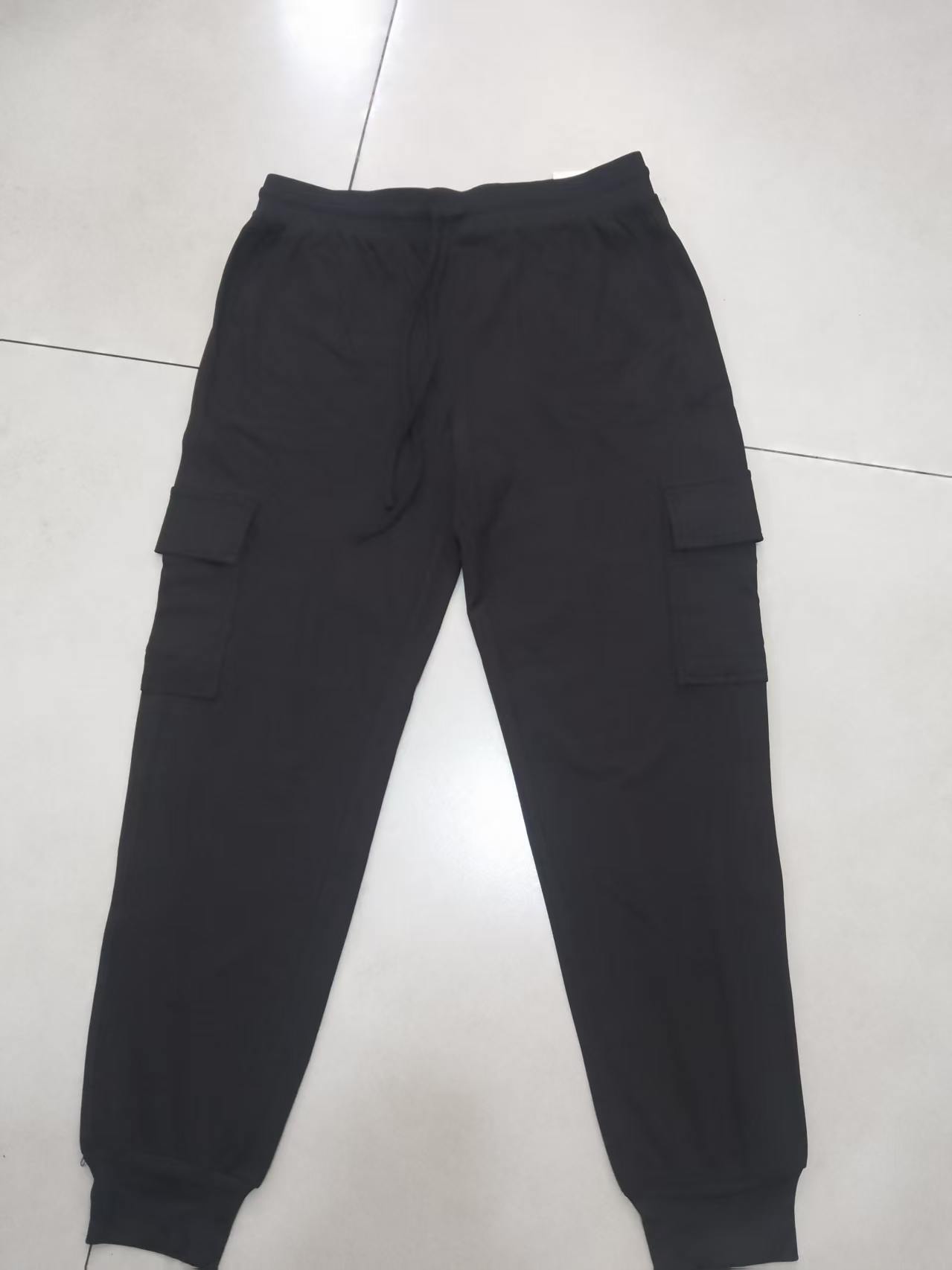 Ladies black multi-pocket cargo jogger pants TF8974 flat lay view