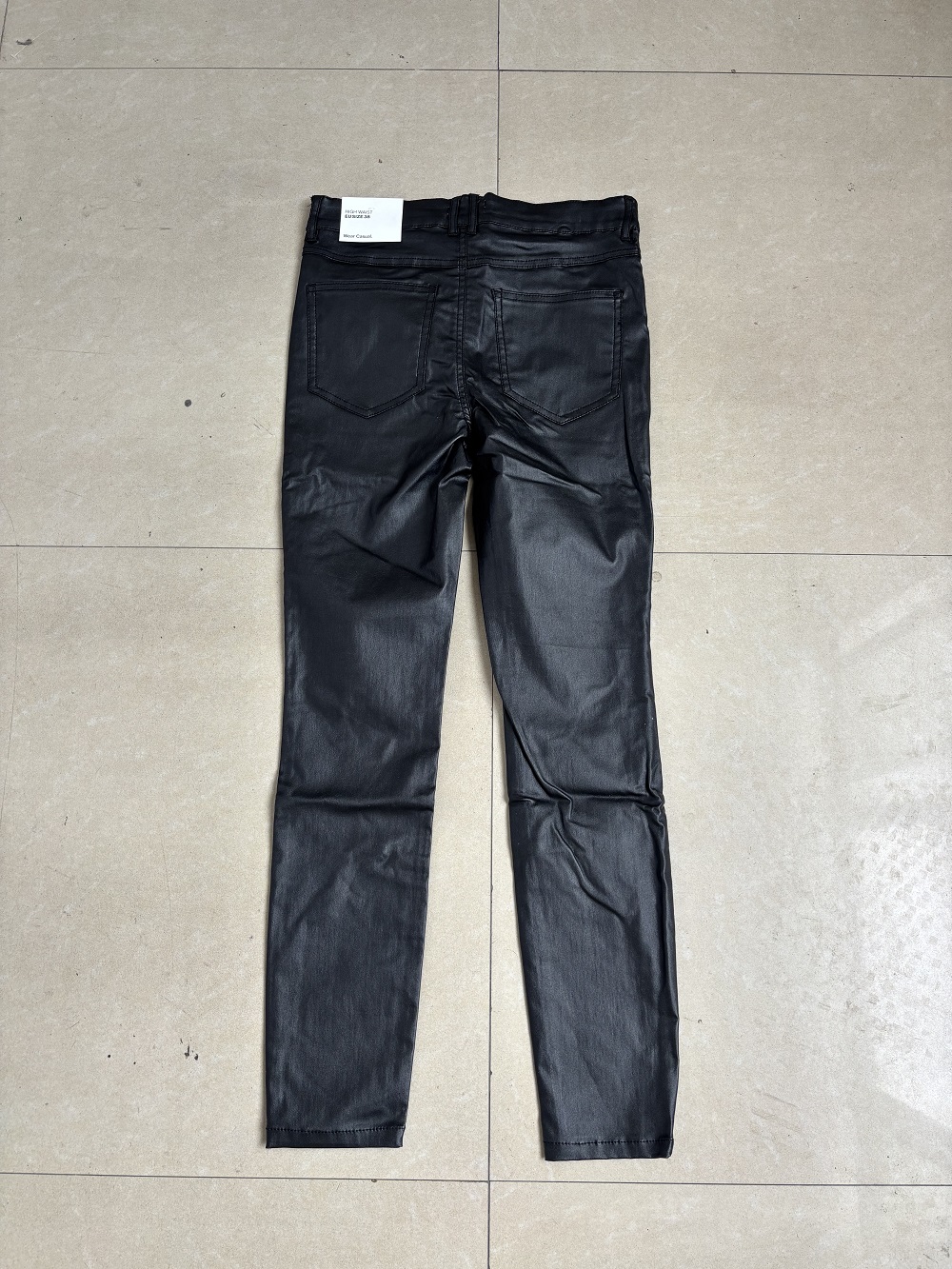 Ladies black coated slim trousers TF8698 flat lay front view