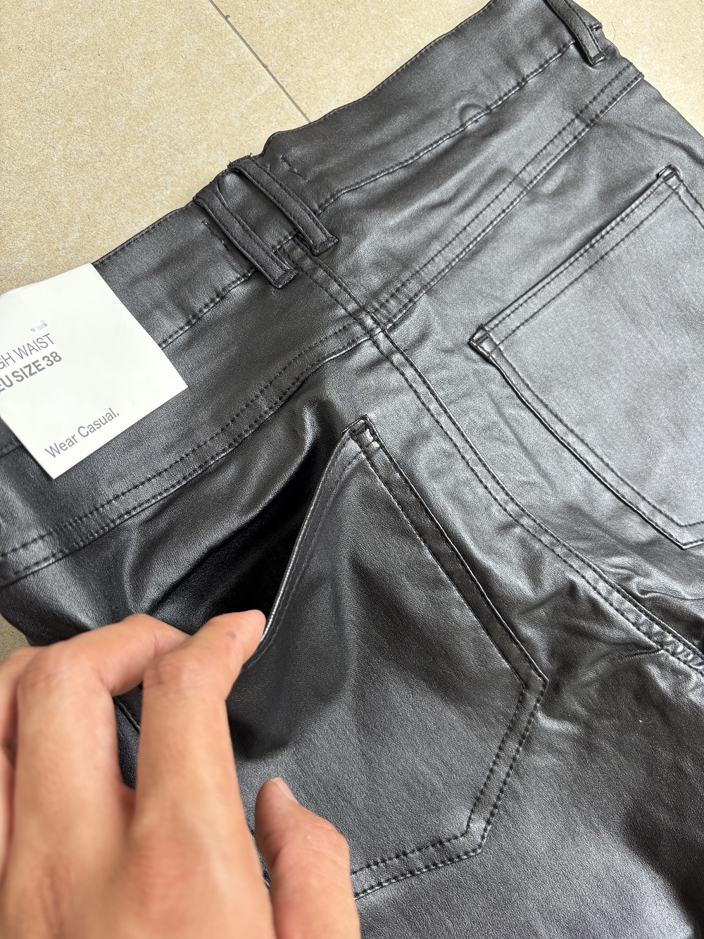 Waist and tag detail ladies black coated slim pants TF8698
