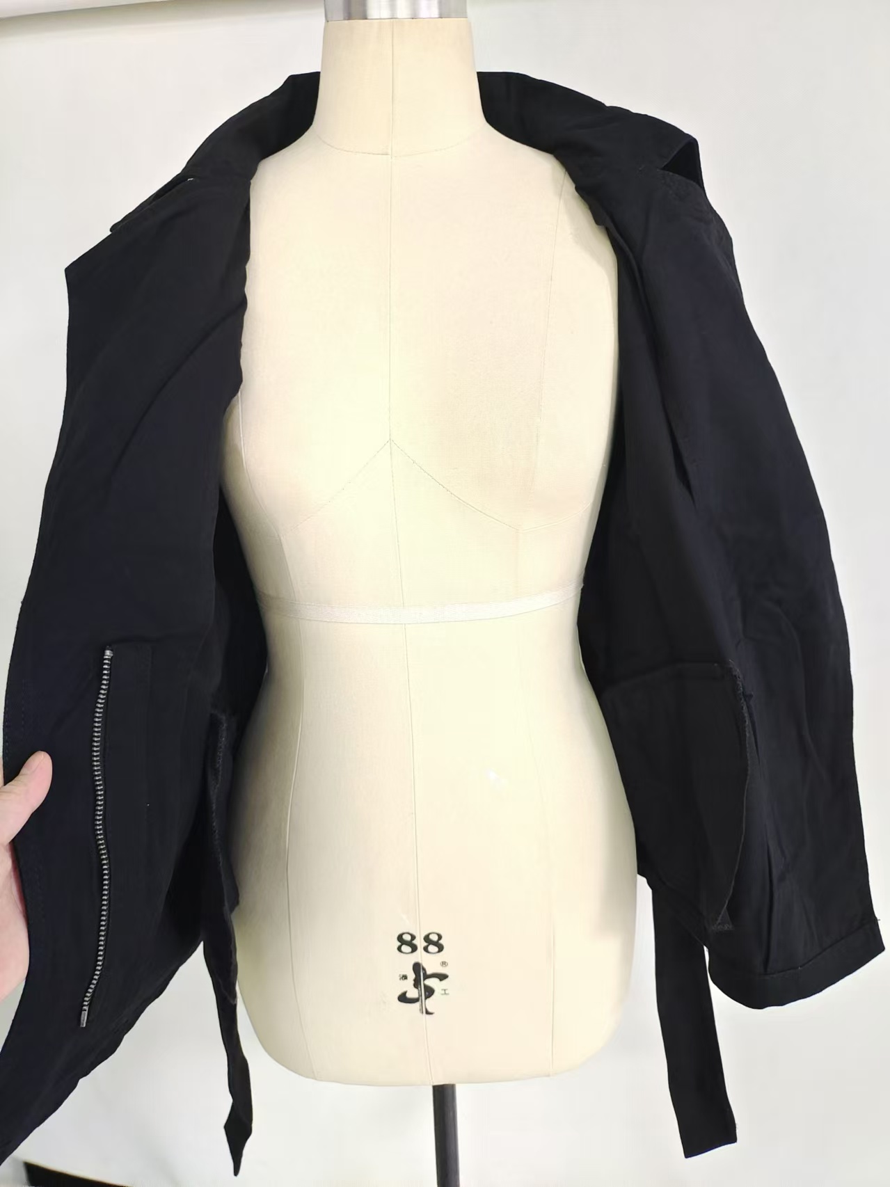 Ladies black cotton jacket open front view on dress form TF8872