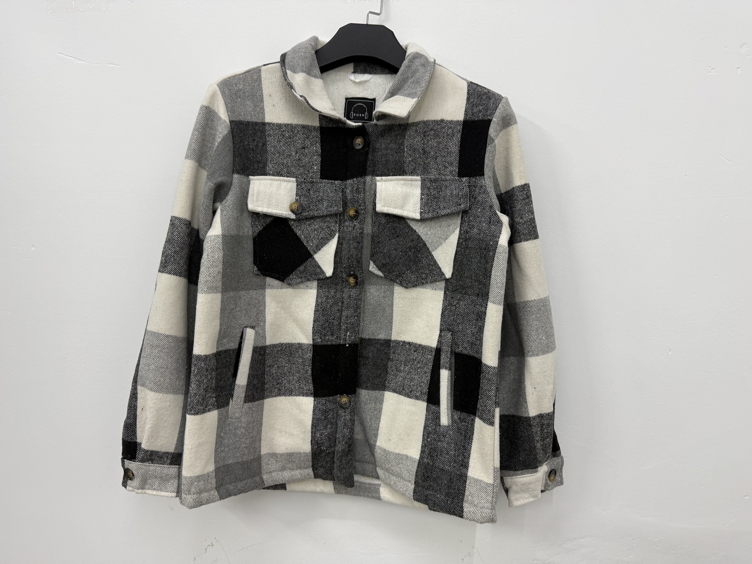 Wholesale ladies black white plaid shacket TF8910 hanging front view