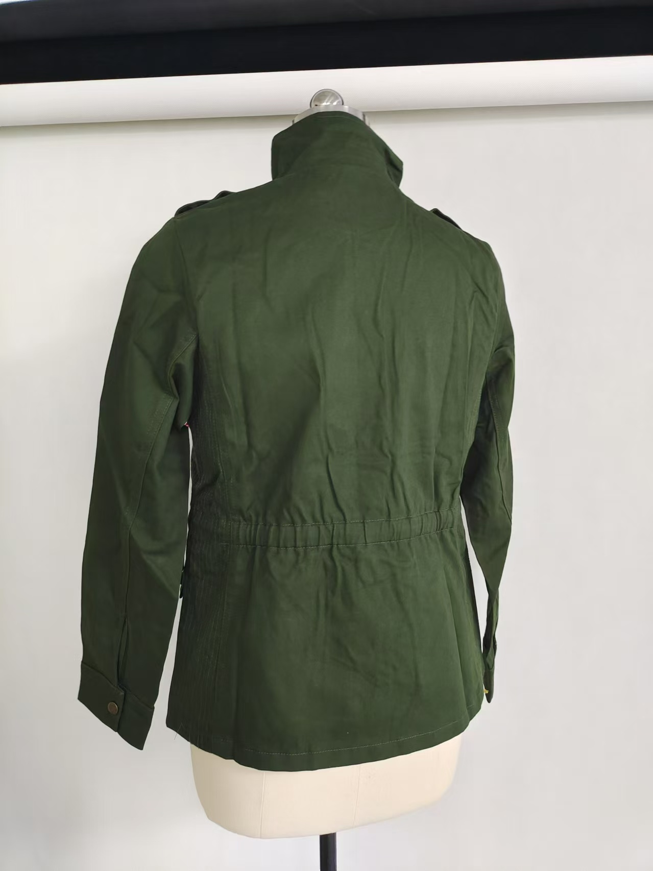 Ladies green stand collar outdoor jacket TF8871 back view on mannequin