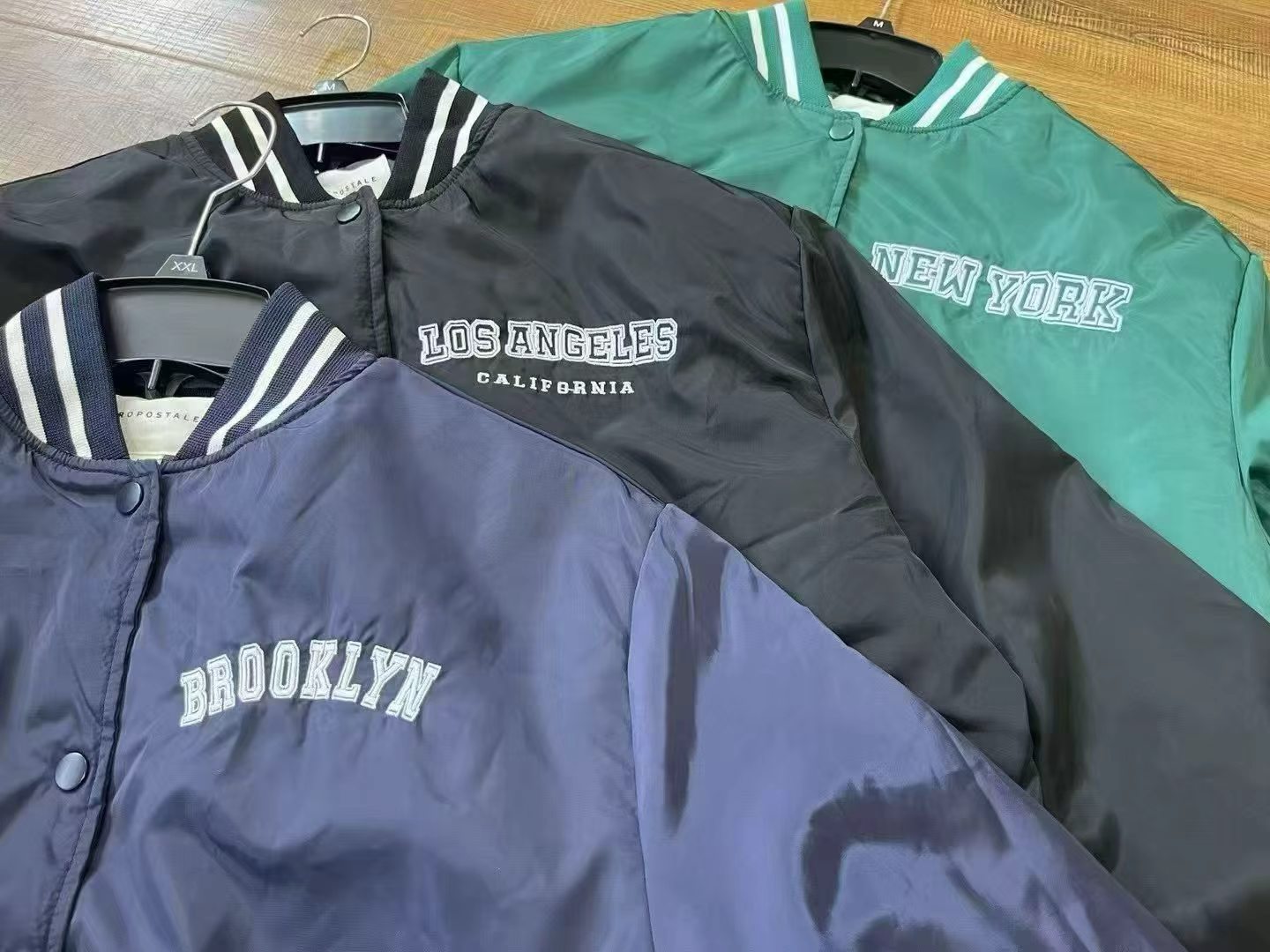 Men's baseball jacket in black, navy blue, and green style TF8665 wholesale ready stock