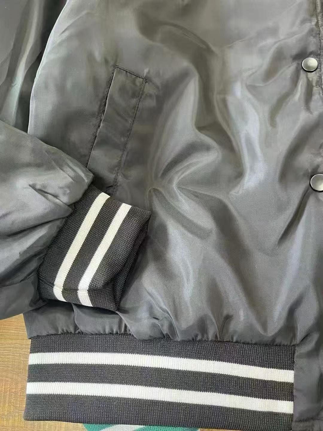 Ribbed collar and zipper closure detail on men's baseball jacket TF8665