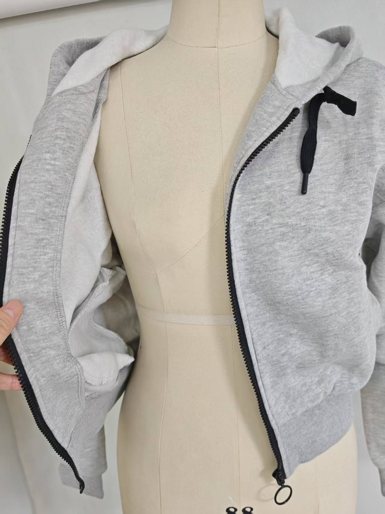 Ladies grey cropped hooded sweatshirt open front view on dress form TF8854
