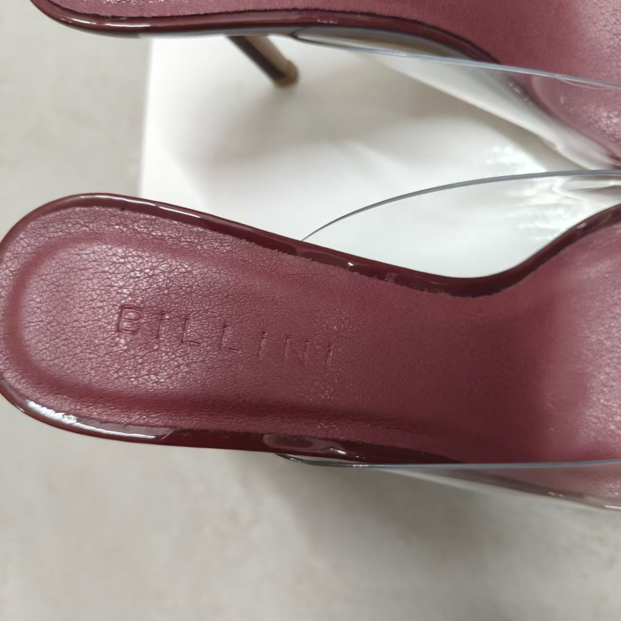 Side view and strap details of ladies wine red high heels TF8979