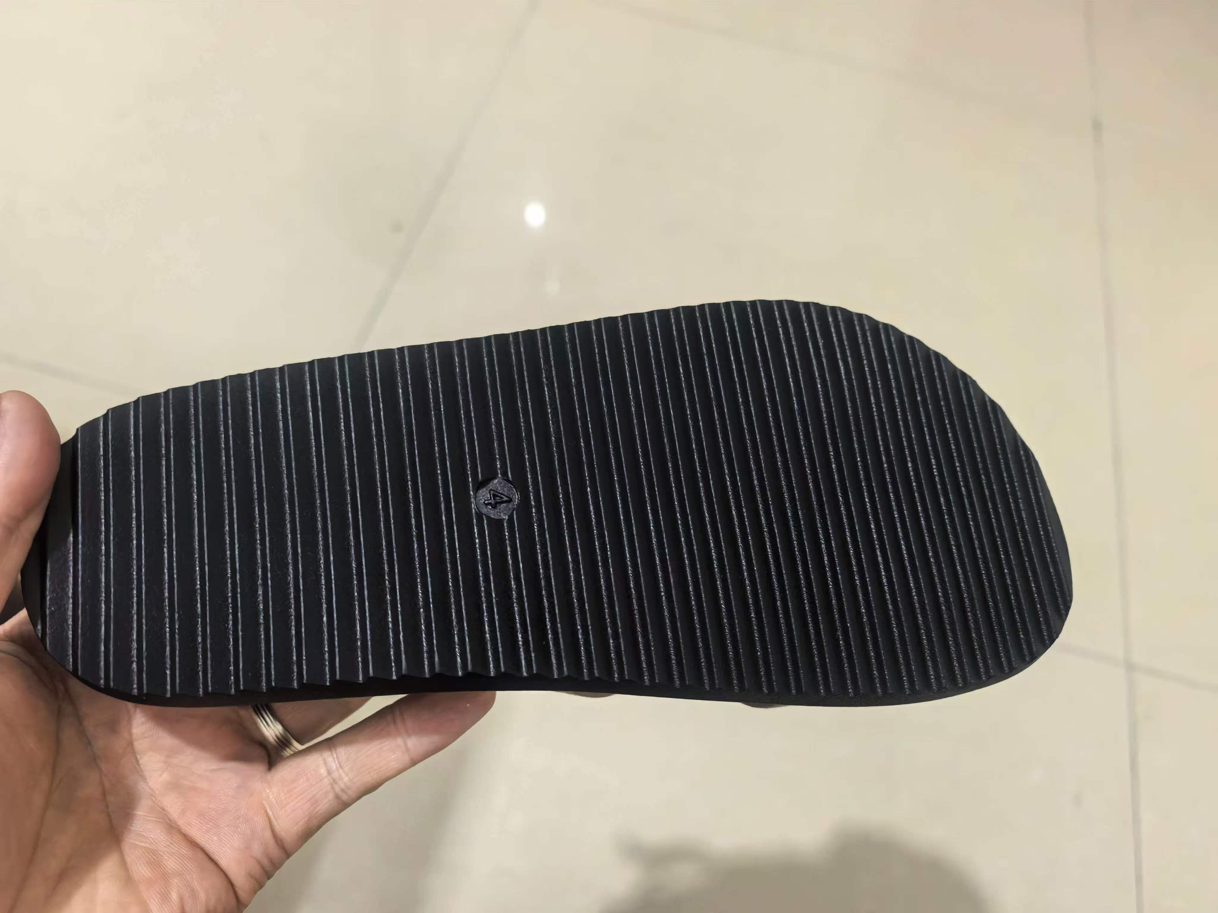 Outsole pattern and bottom view of ladies sandals TF8838