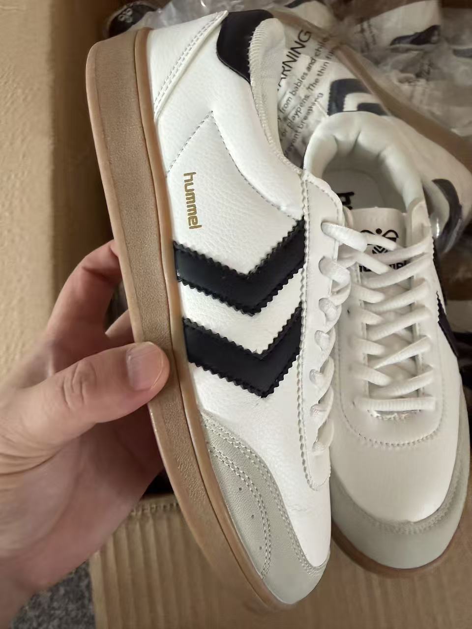 Side view and stripe detail of ladies white sneakers TF8759