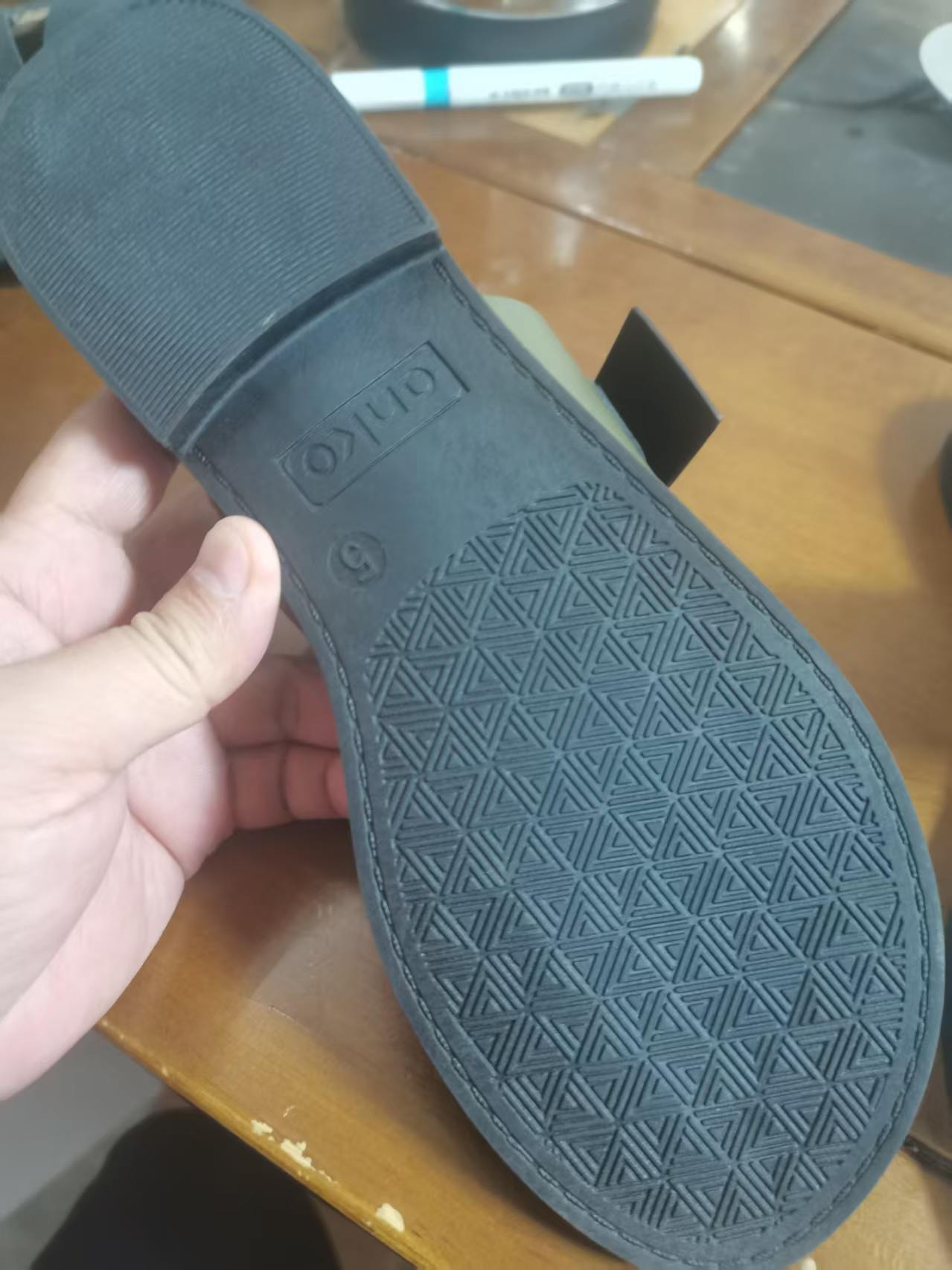 Side view of women's olive green slide slippers style TF8758