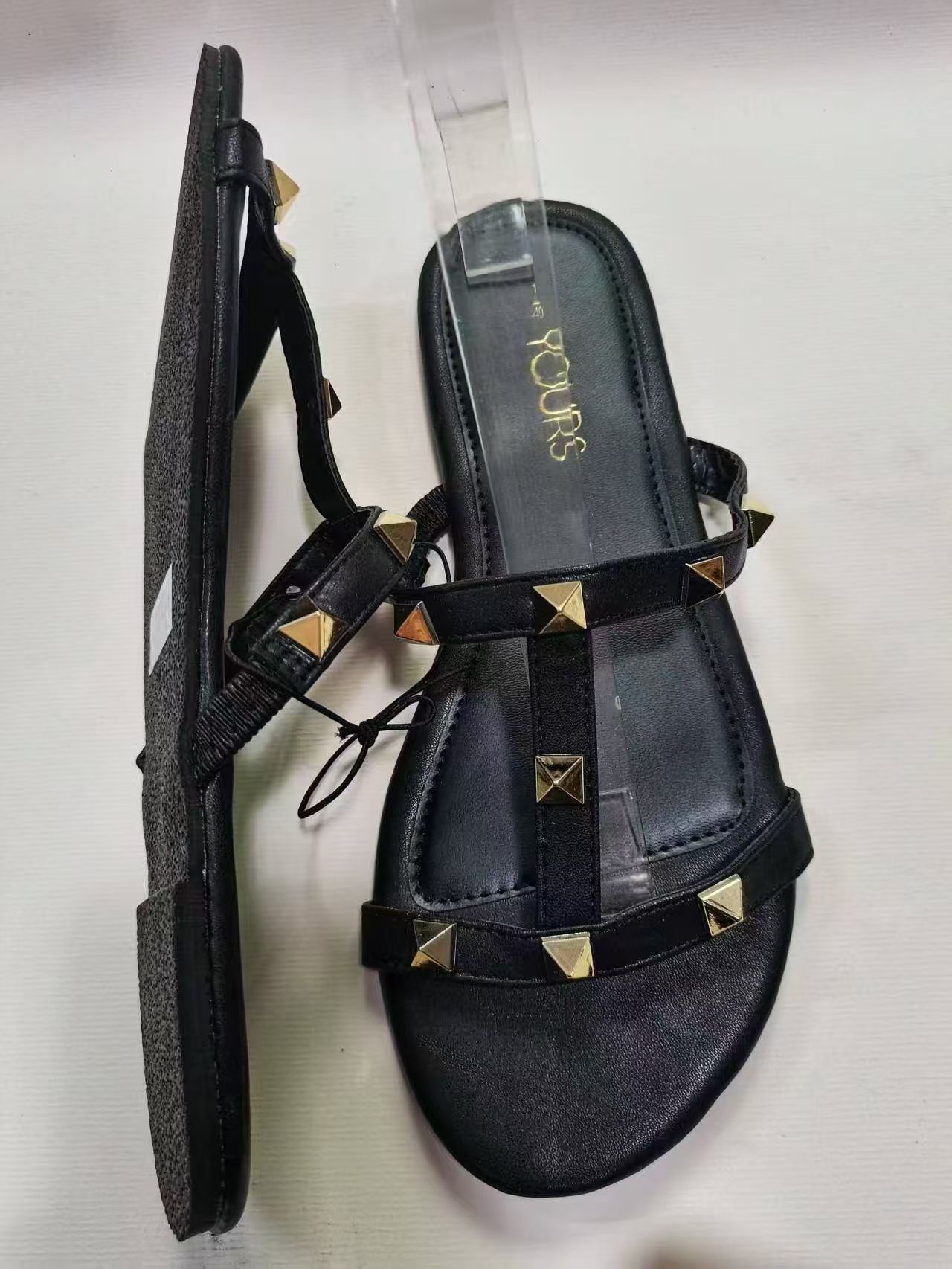 Side view of women's black slide slippers TF8749