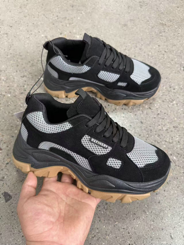 Close up of women's black dad shoes style TF8705