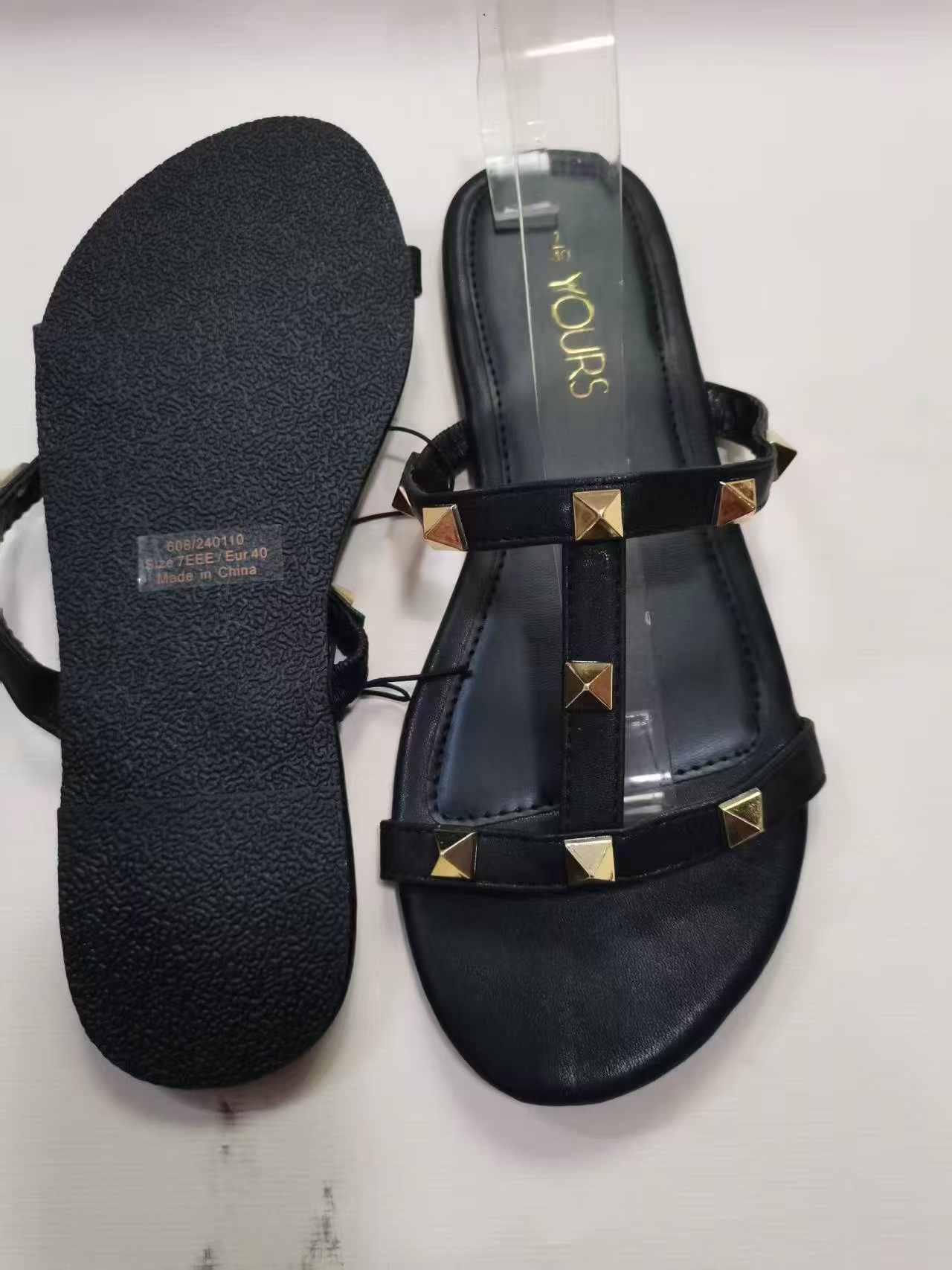 Top and outsole view of ladies black slippers style TF8749