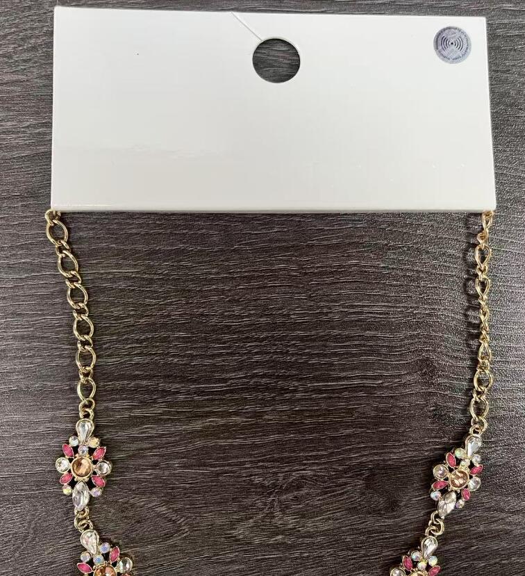 Close up of chain and clasp detail on ladies floral necklace TF3417