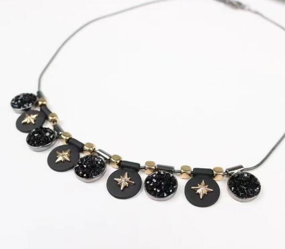 Side view of ladies black pendant necklace style TR6305