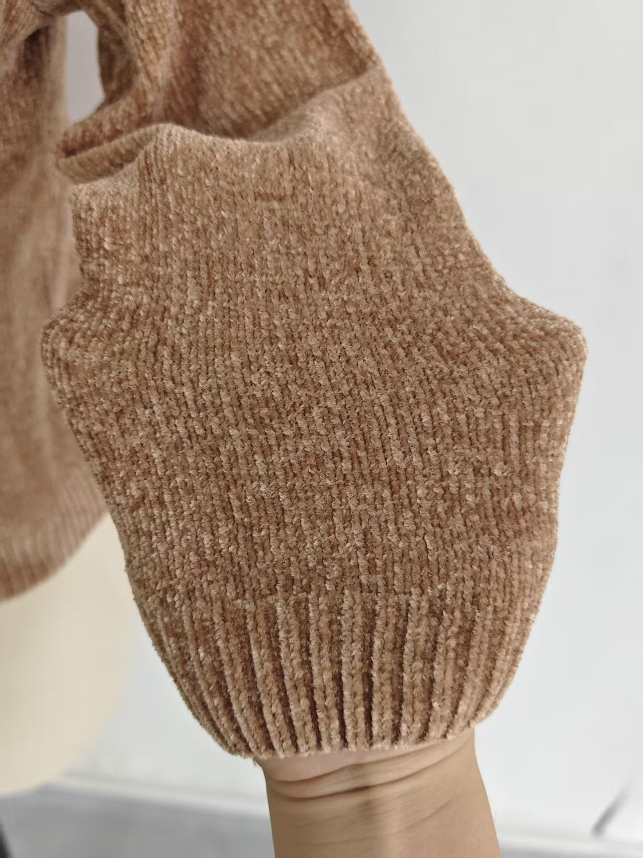 Ribbed cuff and soft knit fabric detail of ladies' sweater TF8040