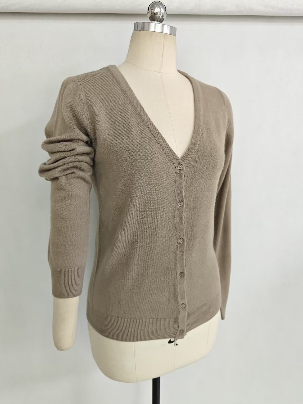 Hanging view of ladies' v-neck knit cardigan sweater style TF8144