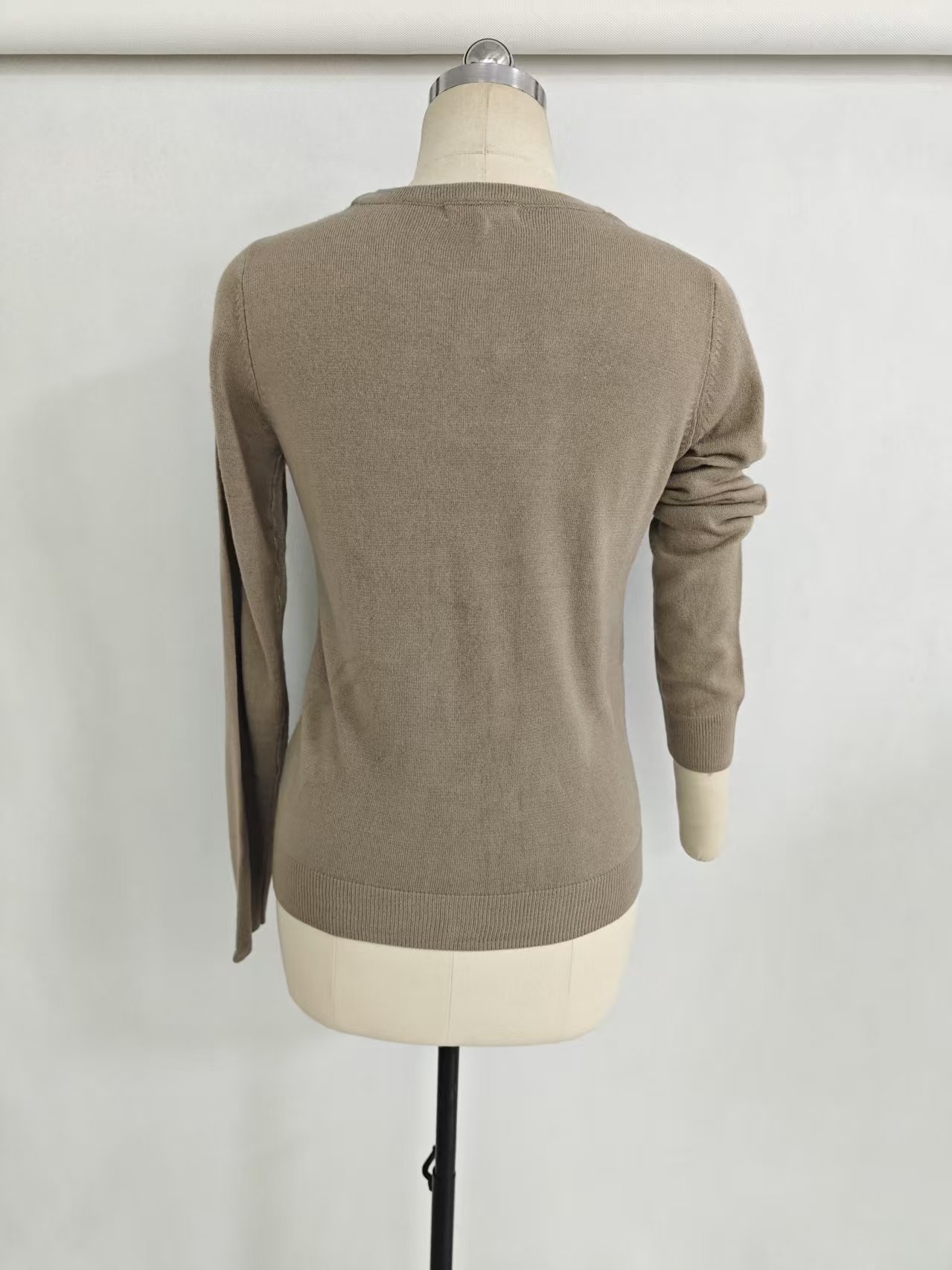 Front view of ladies' v-neck button front cardigan style TF8144