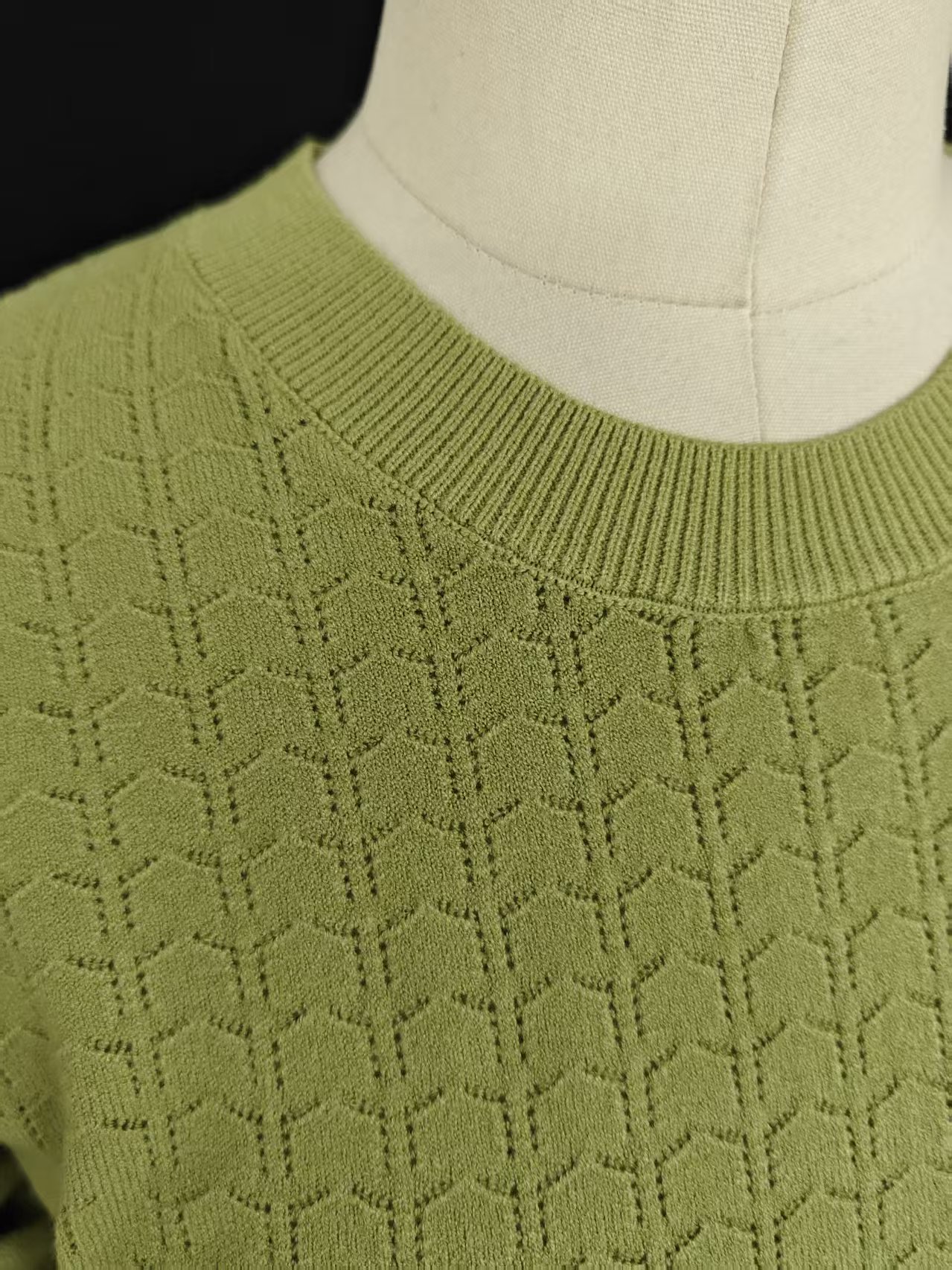 Ribbed cuff and knit fabric texture of ladies' green sweater TF8182