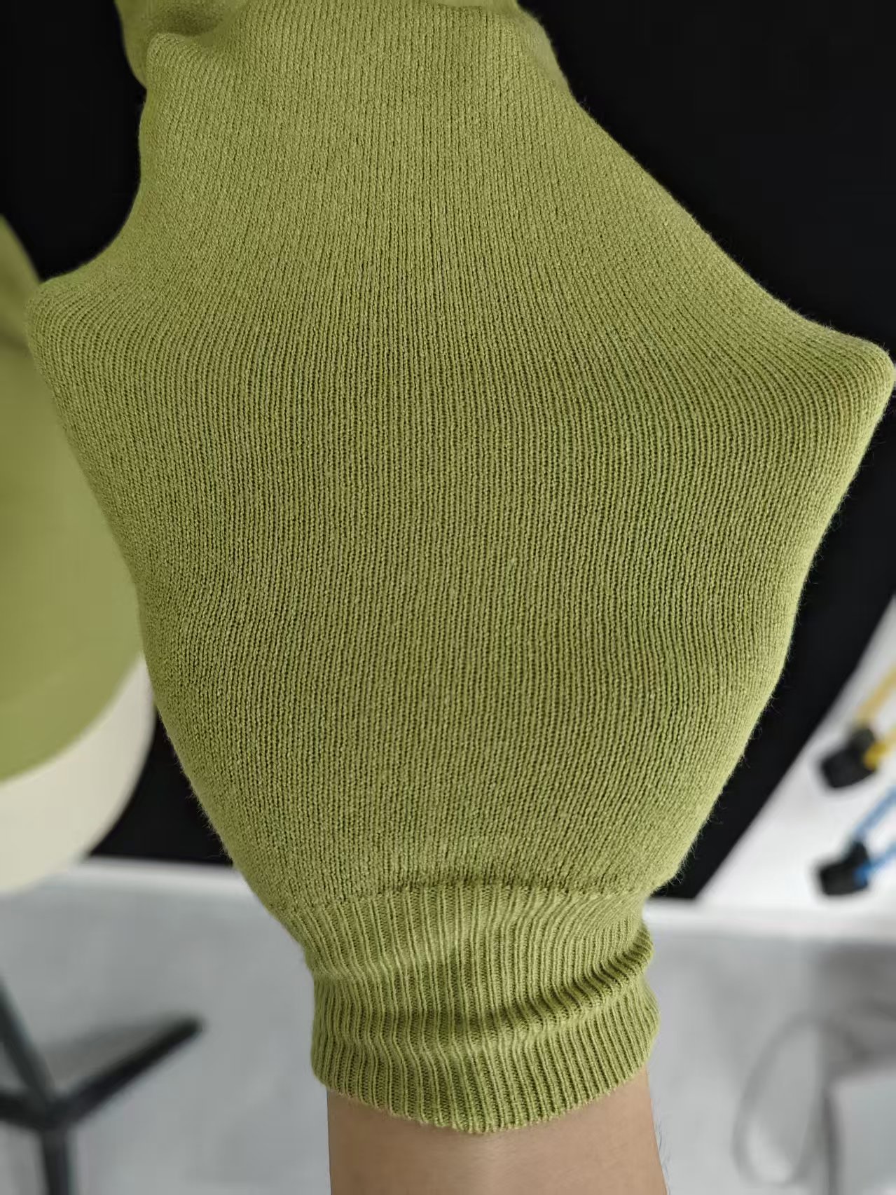 Side seam detail and soft knit texture of ladies' sweater style TF8182