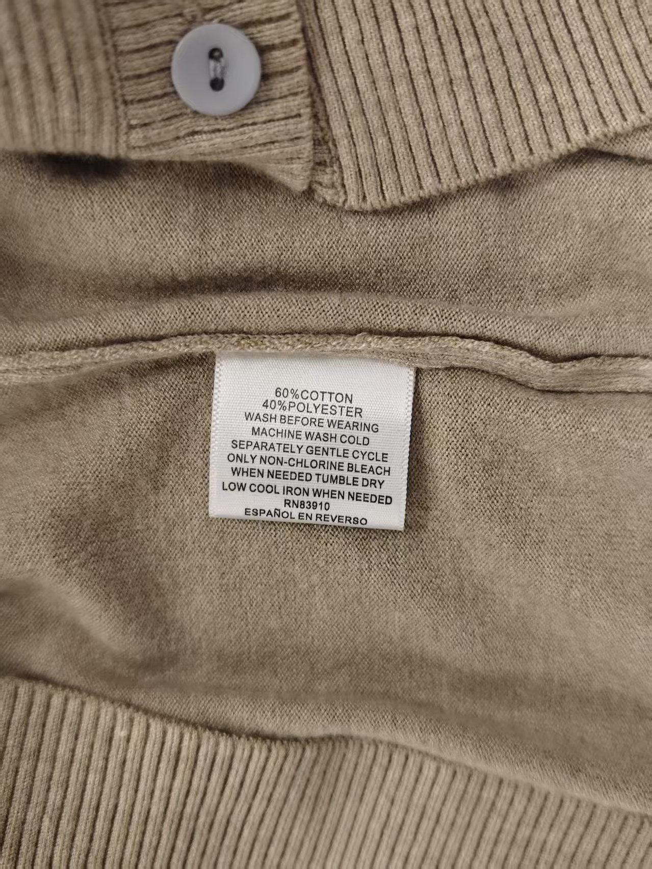 Garment care tag and material composition label on cardigan TF8326