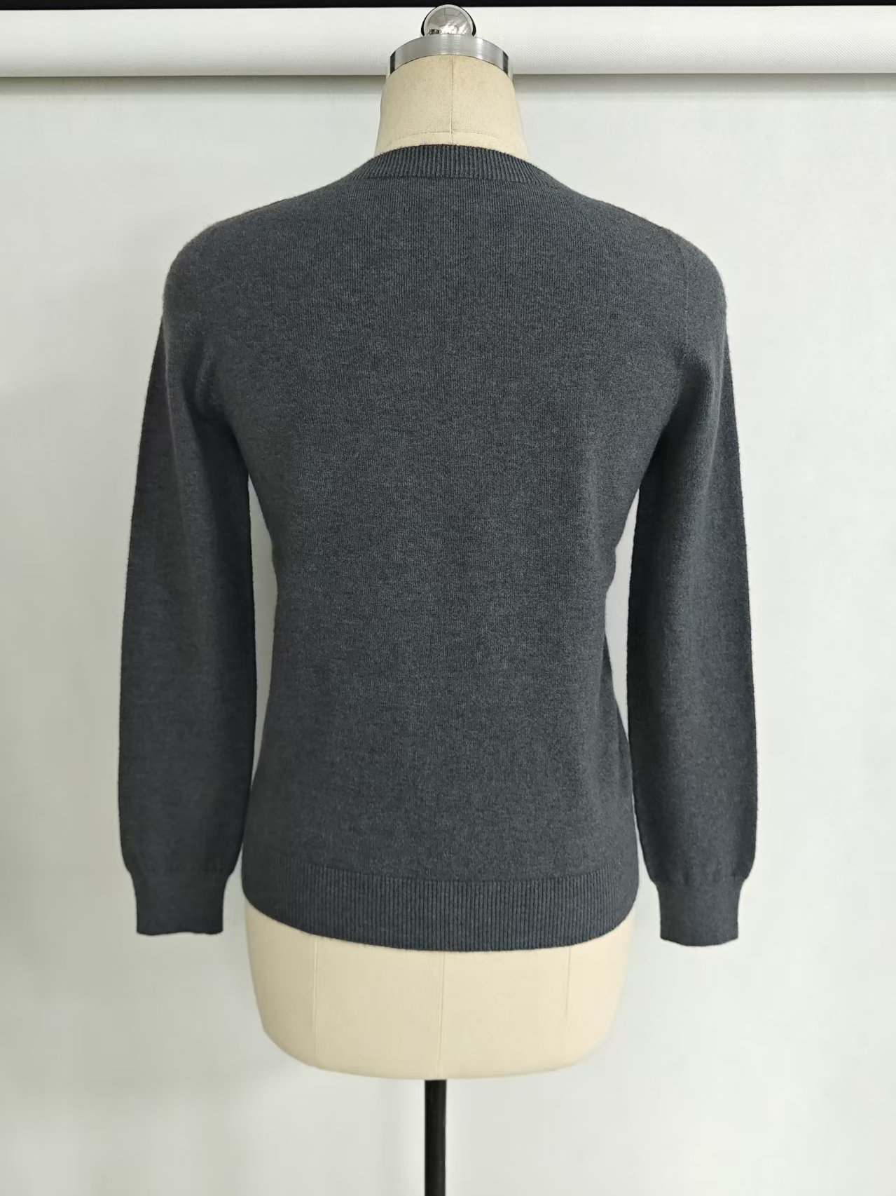 Back view of women's dark grey seamless knit sweater TF9351