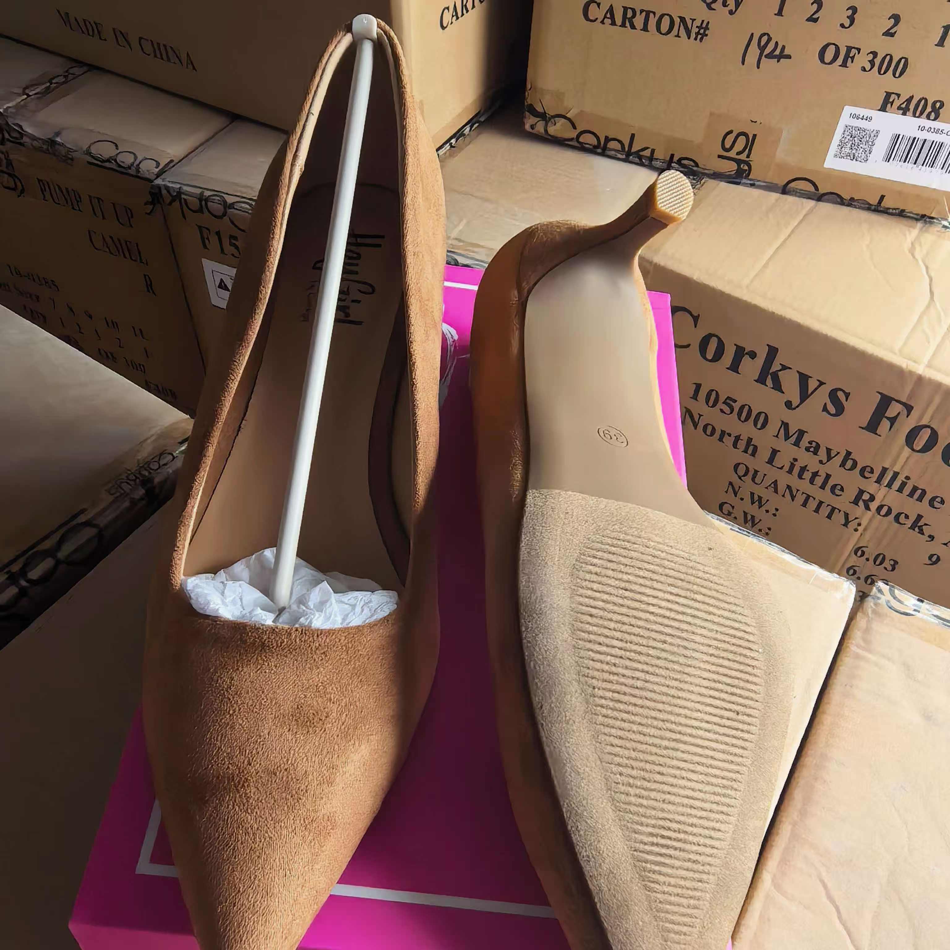 Pair of camel and black women's flat sandals TF9432