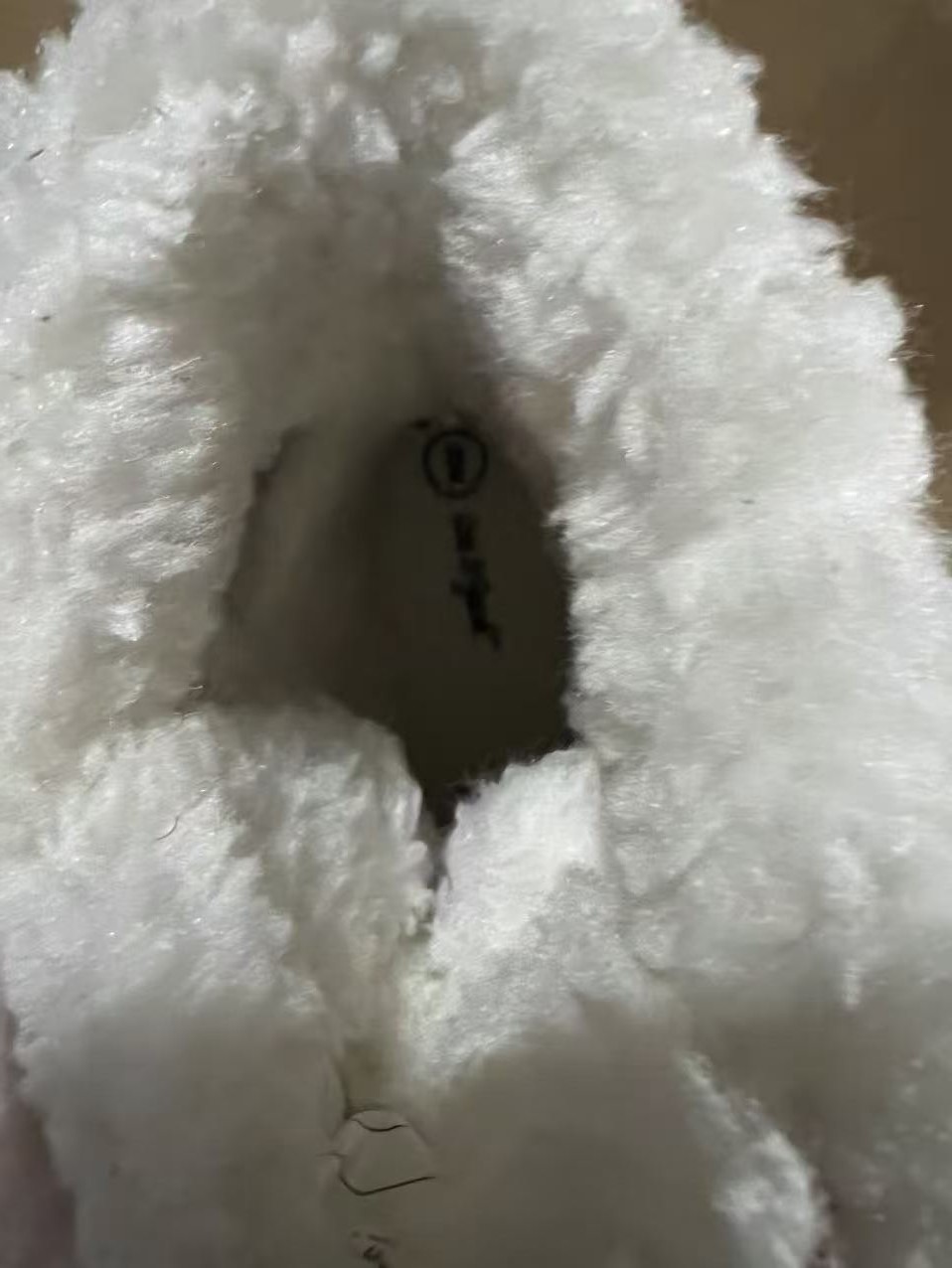 Close-up of soft plush lining inside kids winter boots