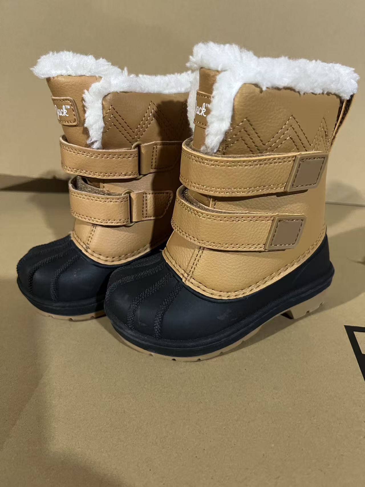 Side view of brown kids warm winter boots TF9454