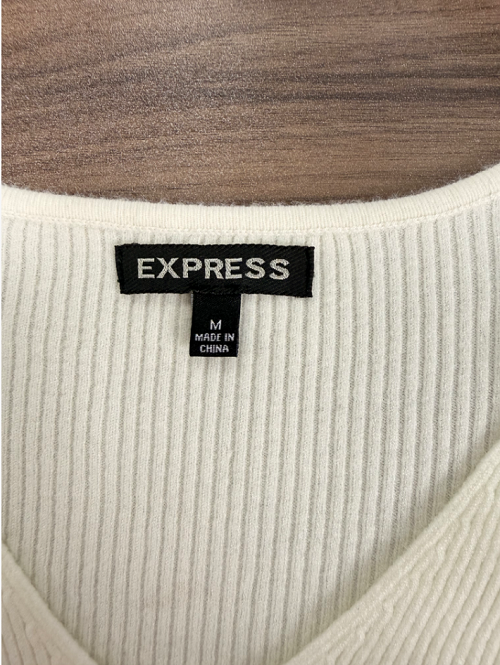 Brand neck label detail on ladies' knit sweater TF9266