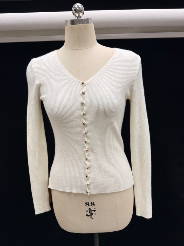 Front view of women's v-neck long sleeve knit pullover sweater