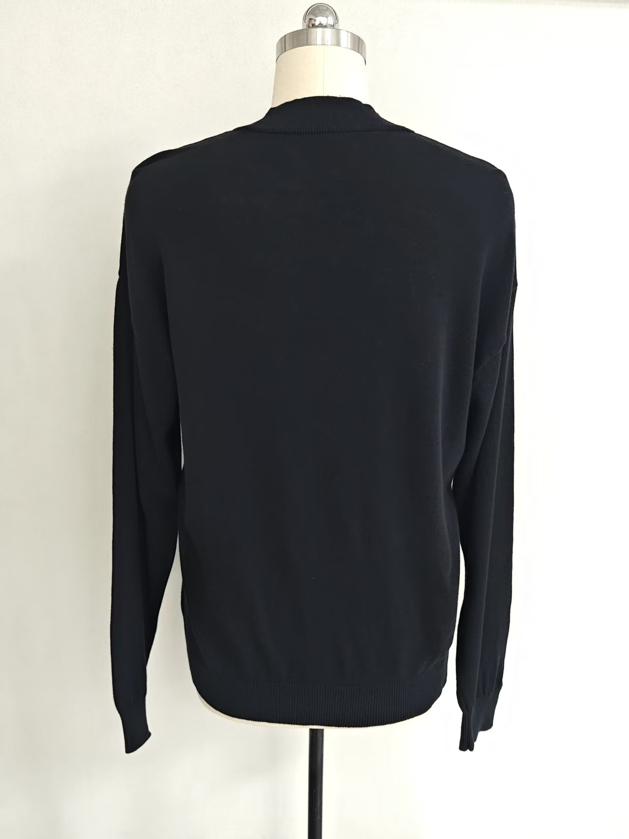 Back view of women's black cotton button-up cardigan TF9282